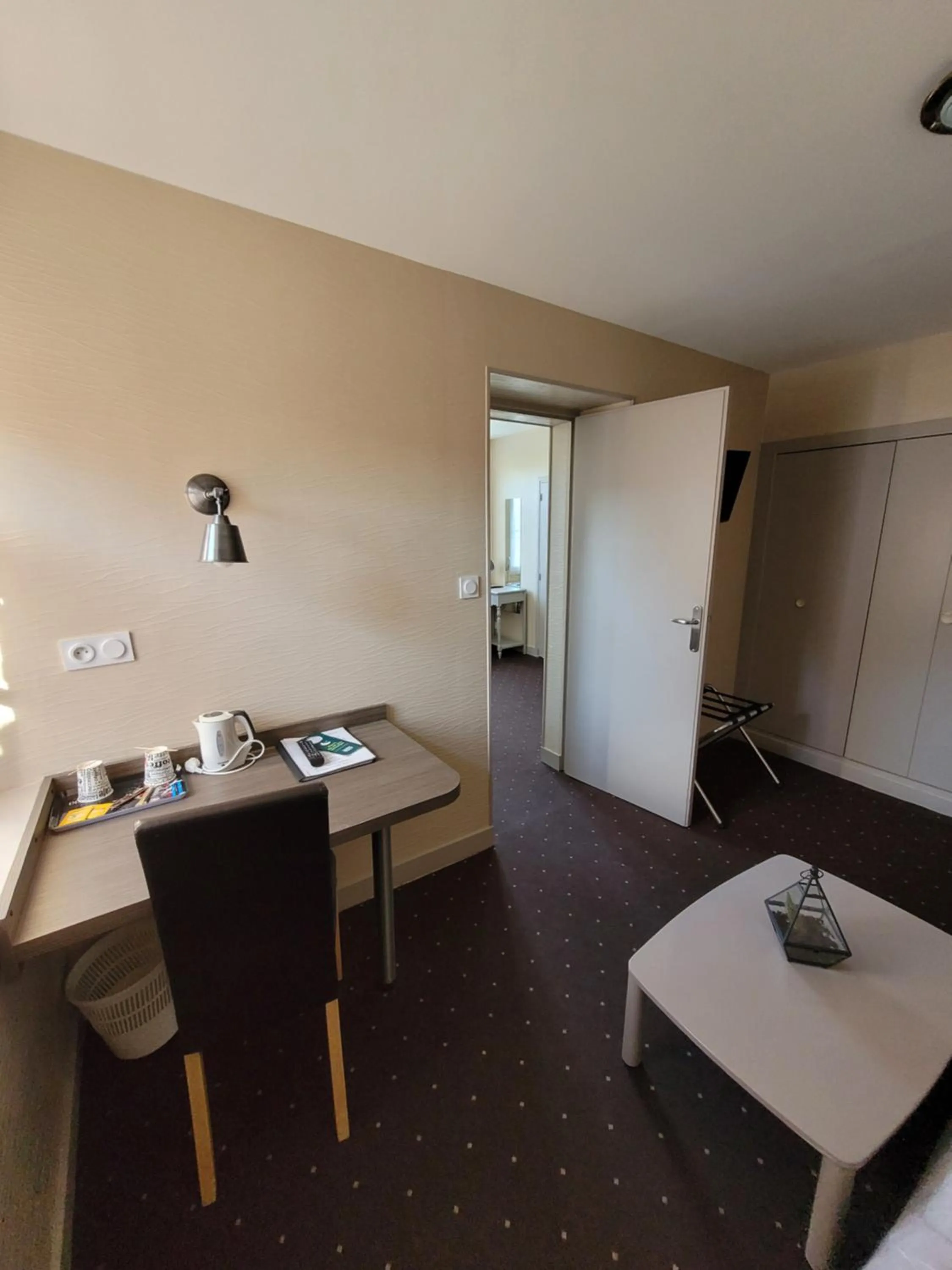 Seating area, Bed in Hotel Logis Au Moyne de Saire