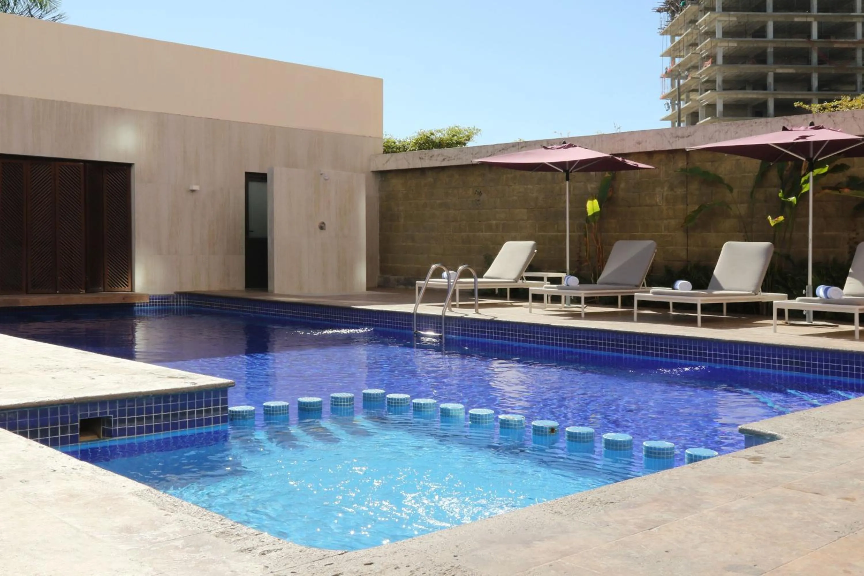 Swimming pool in City Express Plus by Marriott Puerto Vallarta