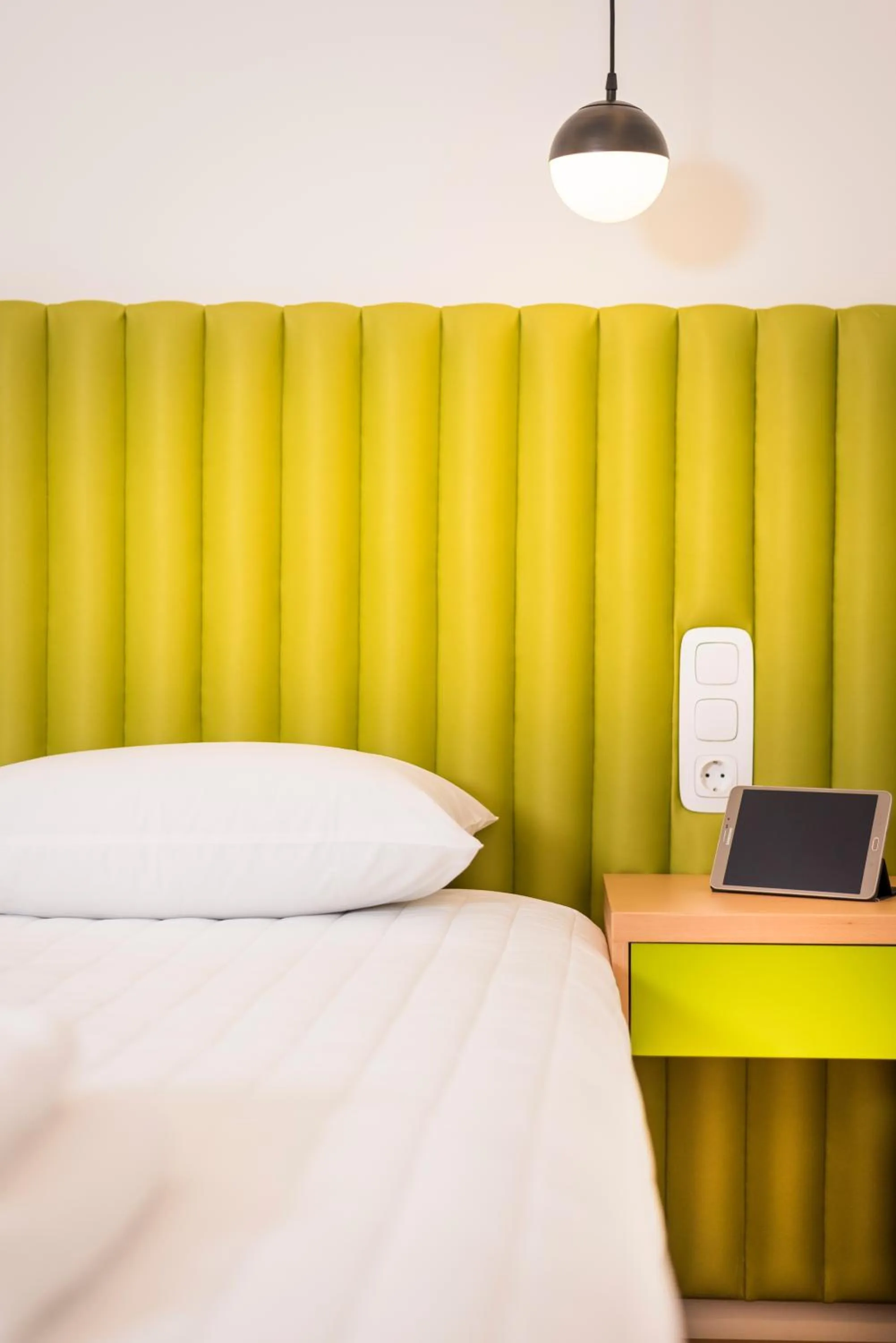 Bed in TheJoy City Suites