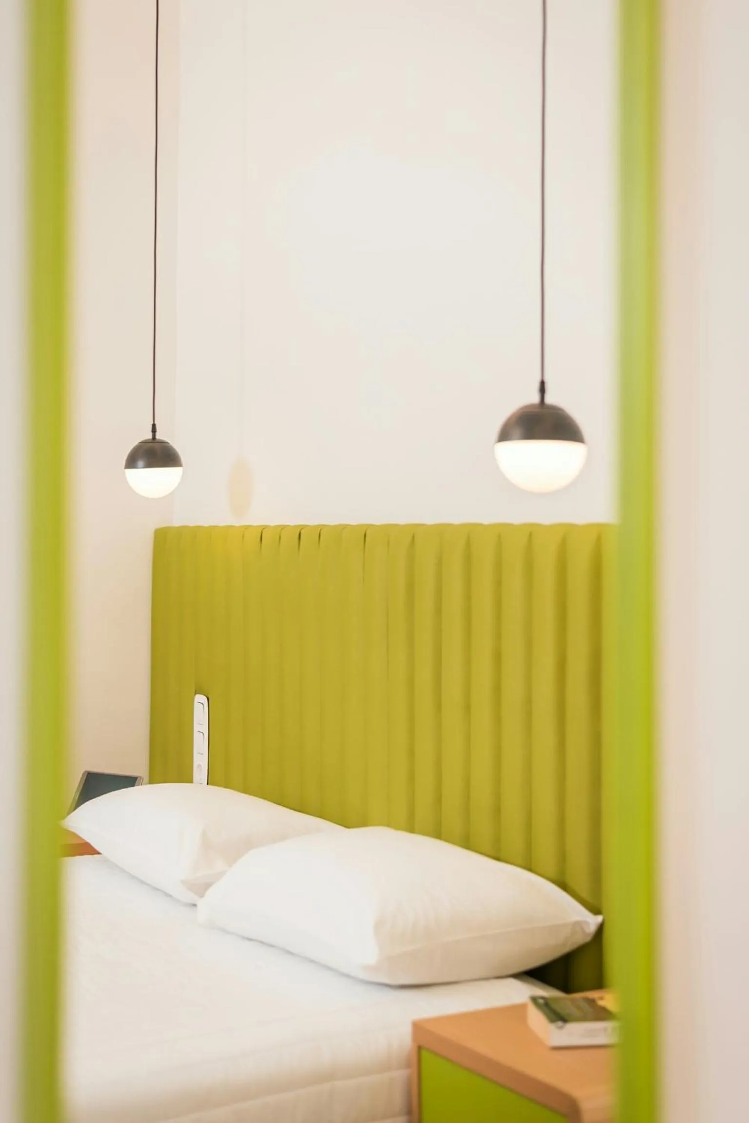 Bed in TheJoy City Suites