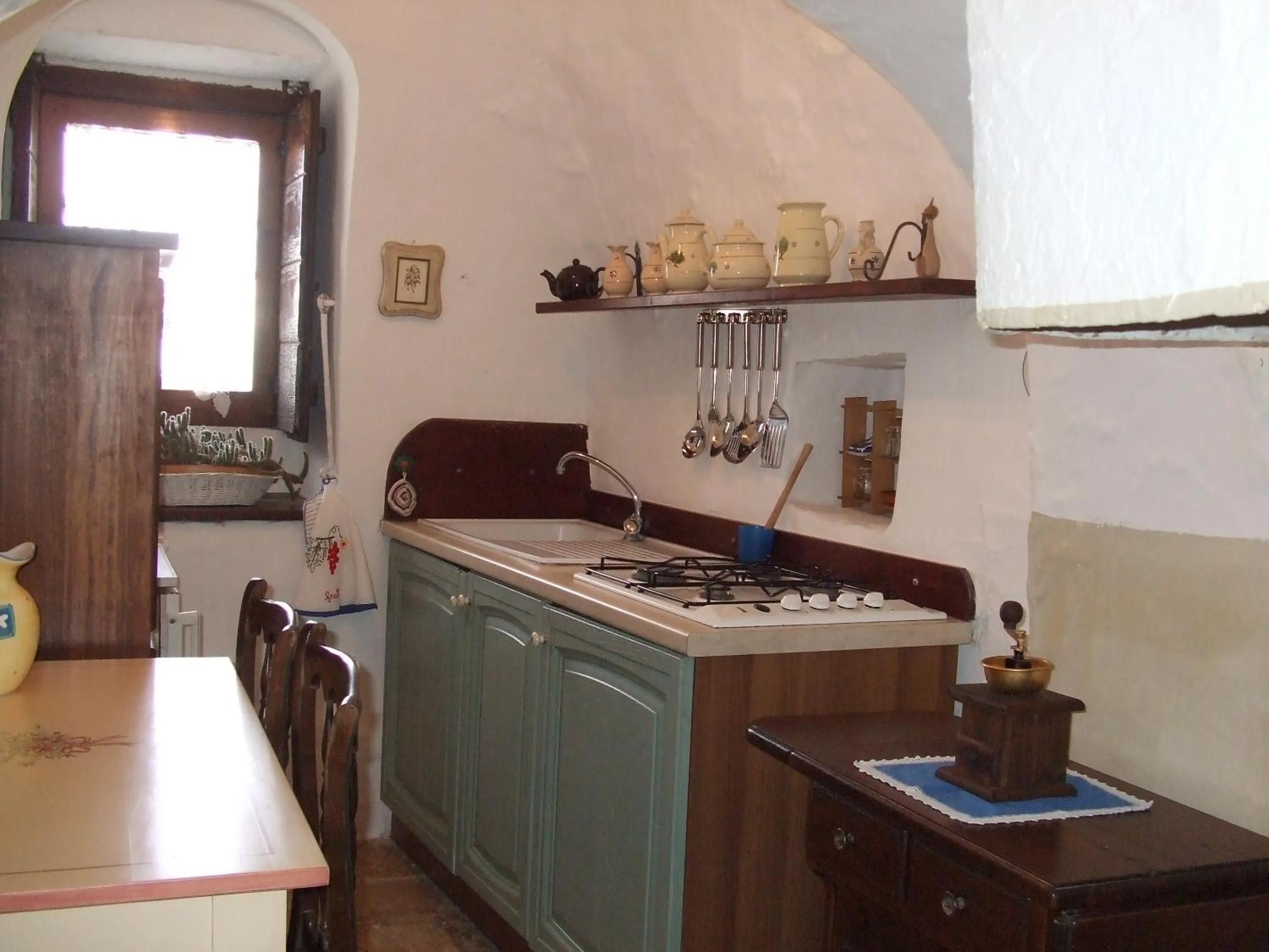 Kitchen or kitchenette in Trulli la casa di Rosa