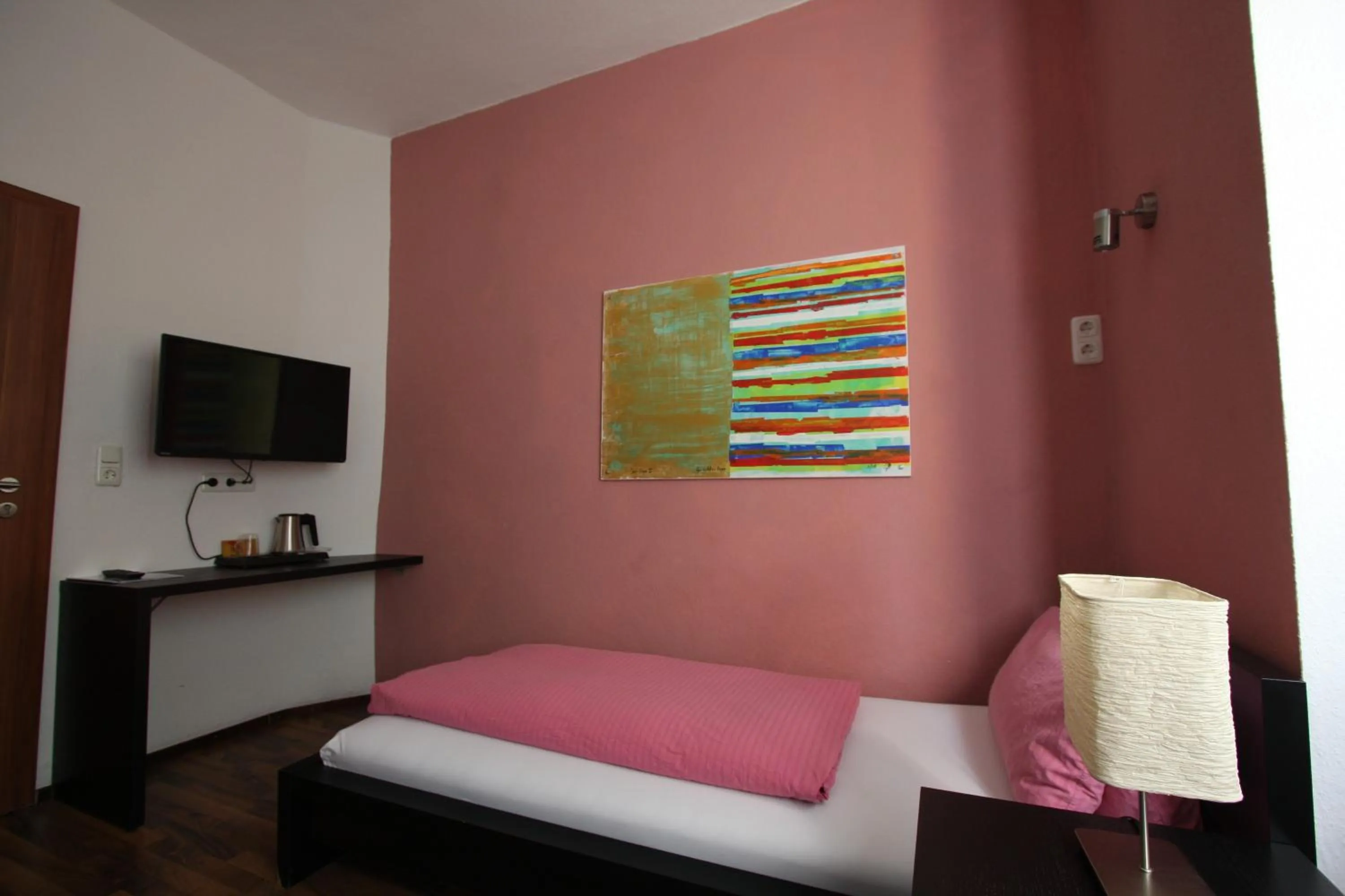 Photo of the whole room, Bed in Stadthotel Kleiner Berg