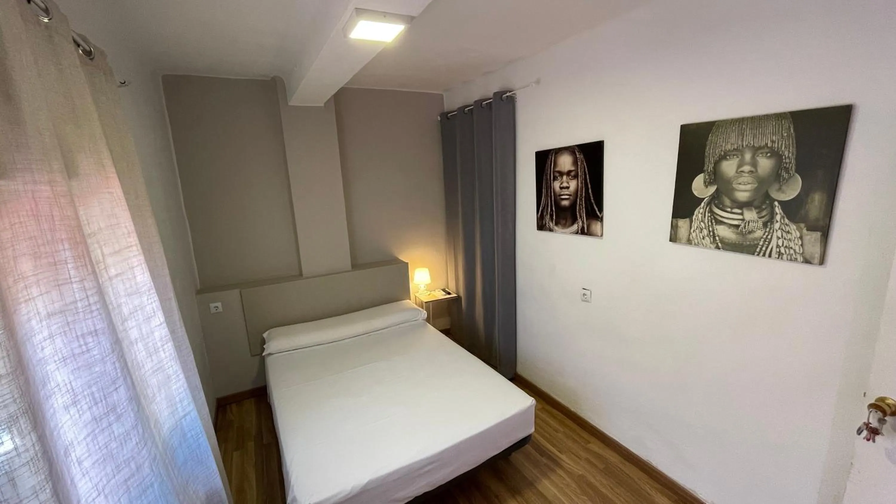 Bed in Pensión Duquesa Bed & Breakfast