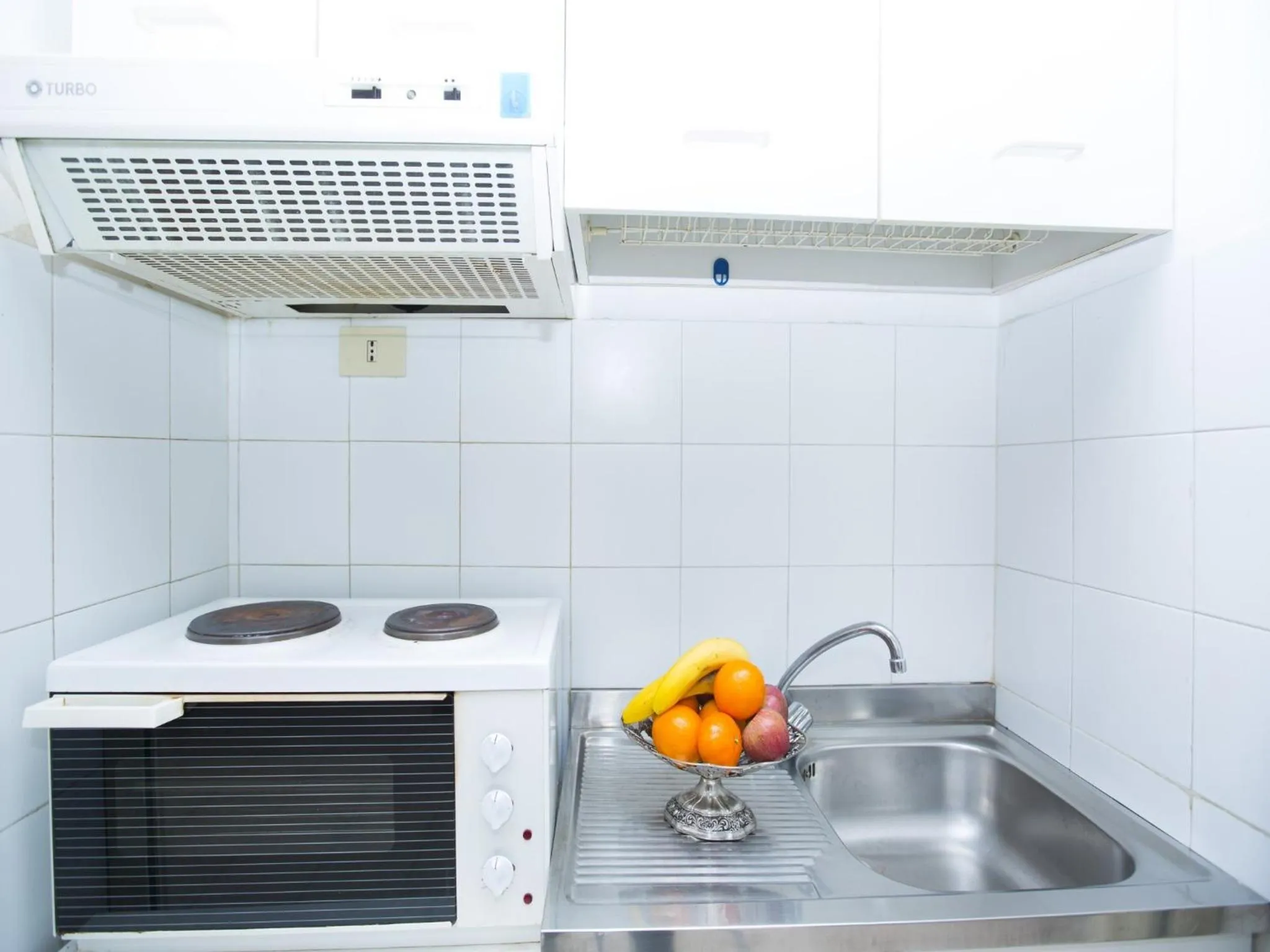 Kitchen or kitchenette in Hotel Residence Villa Tassoni