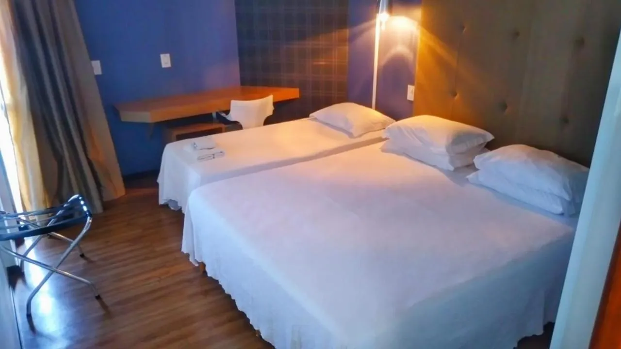 Bed in Livramento Palace Hotel