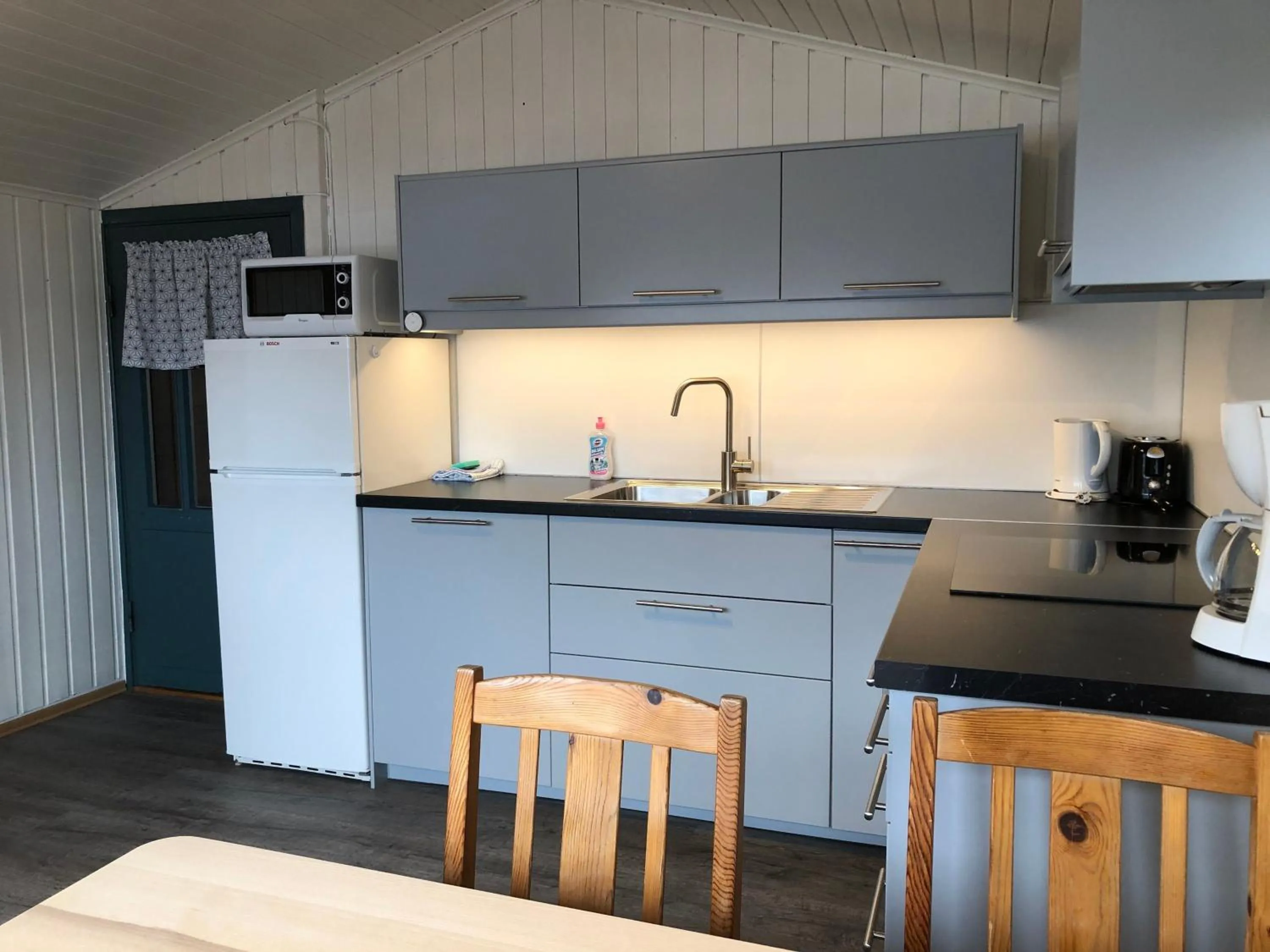 Kitchen or kitchenette in Langenuen Motel & Camping