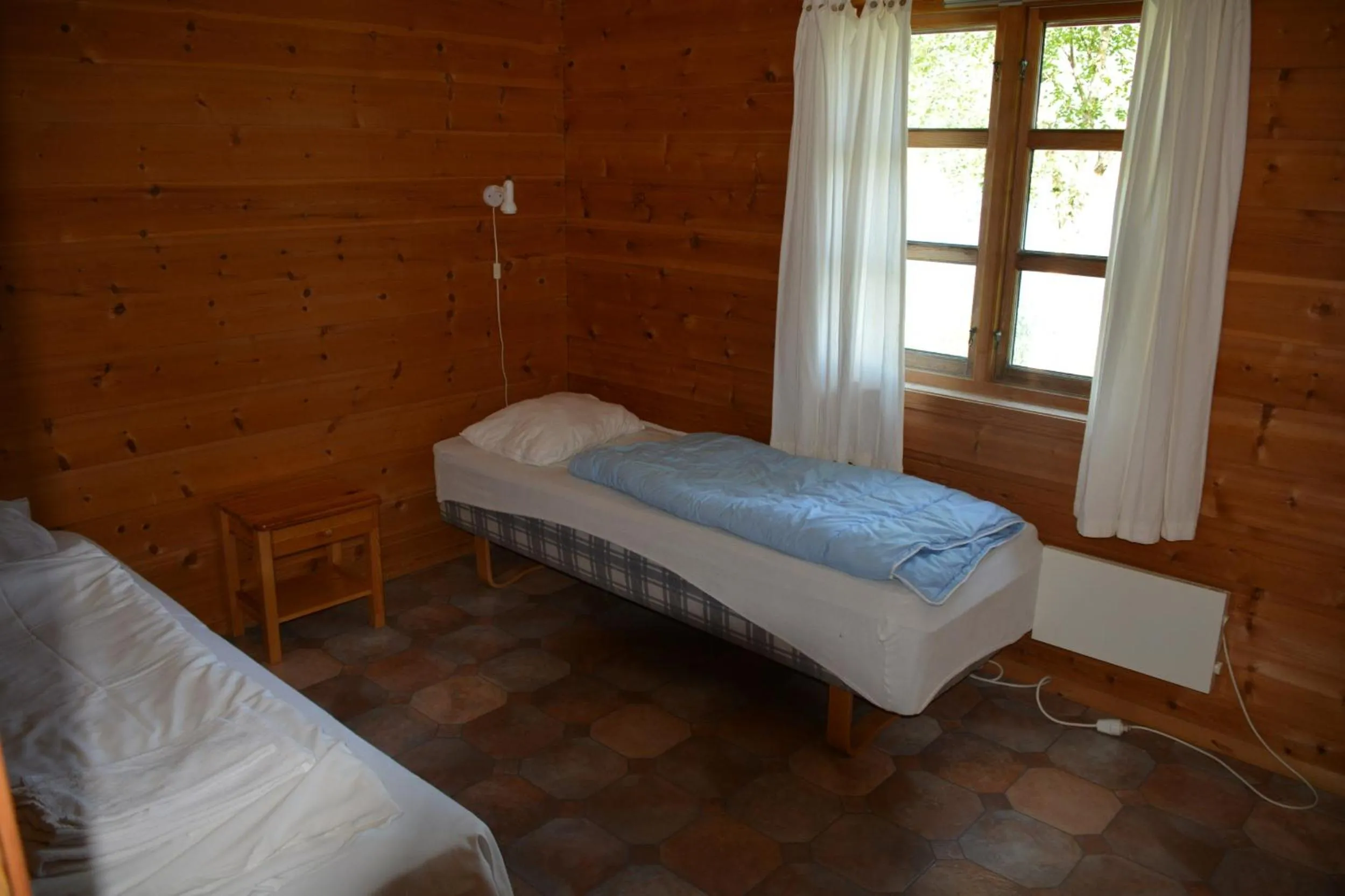 Bed in Langenuen Motel & Camping