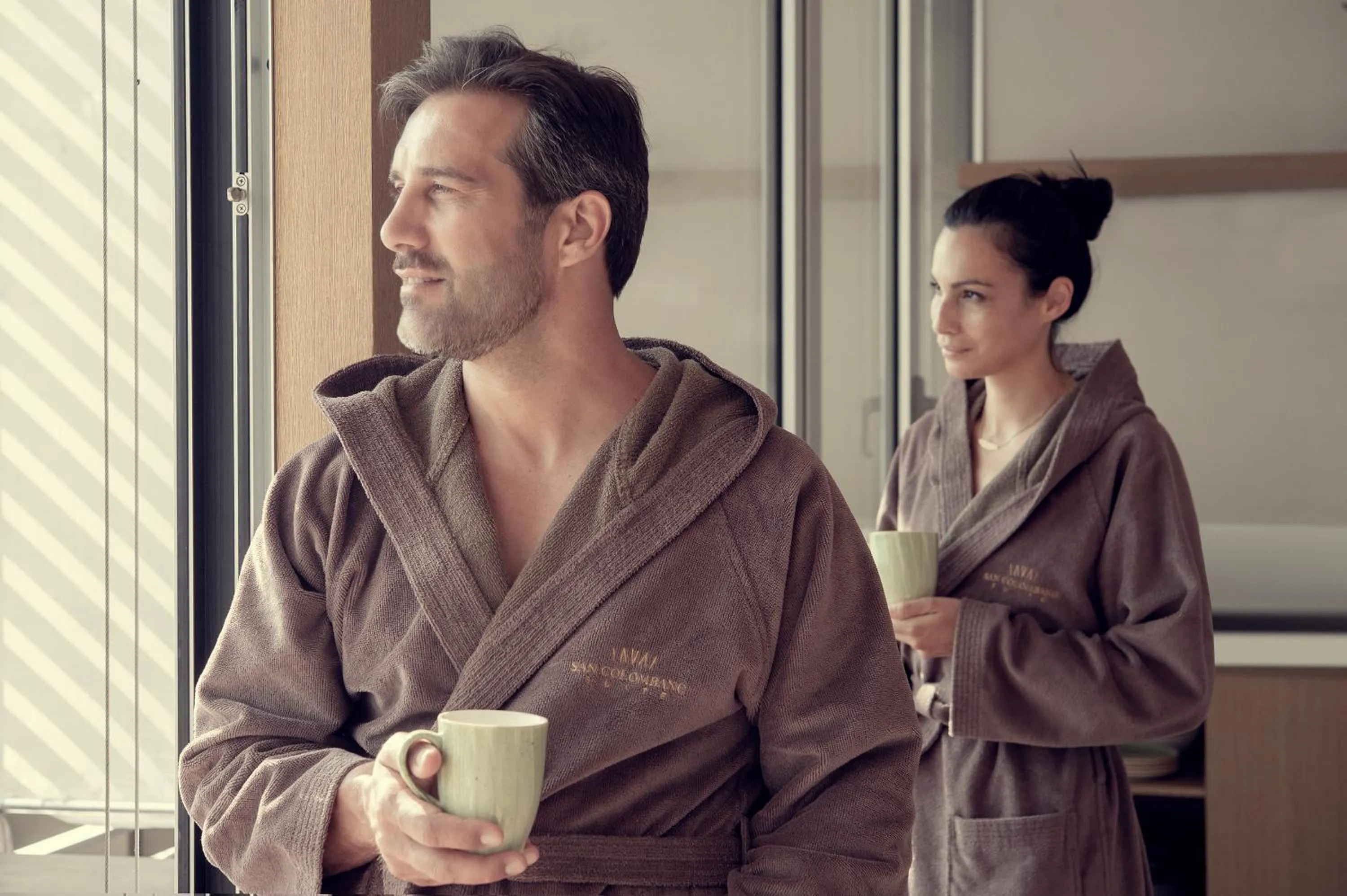 Kitchen or kitchenette in San Colombano Suites