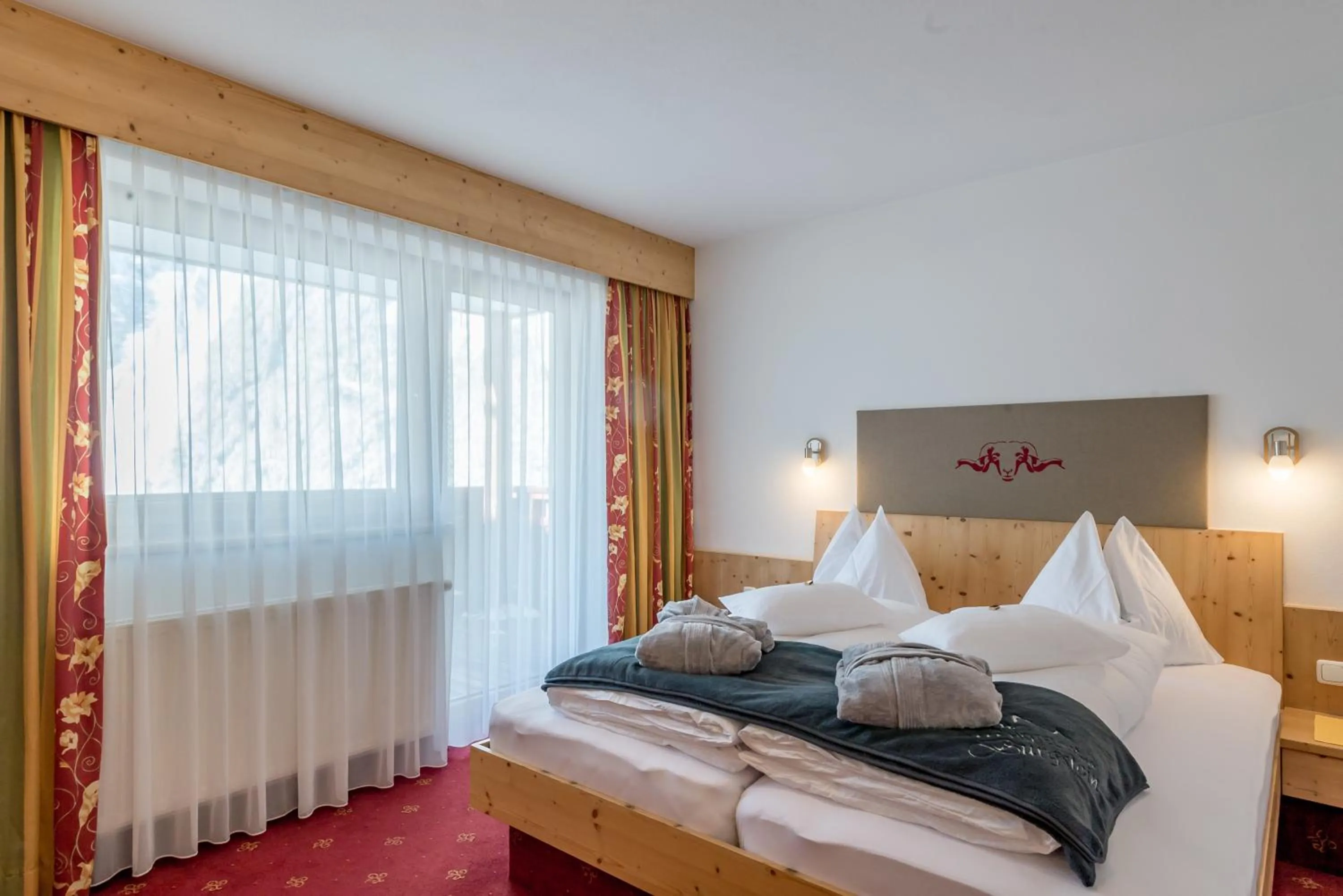 Photo of the whole room, Bed in Hotel Burgstein - alpin & lifestyle