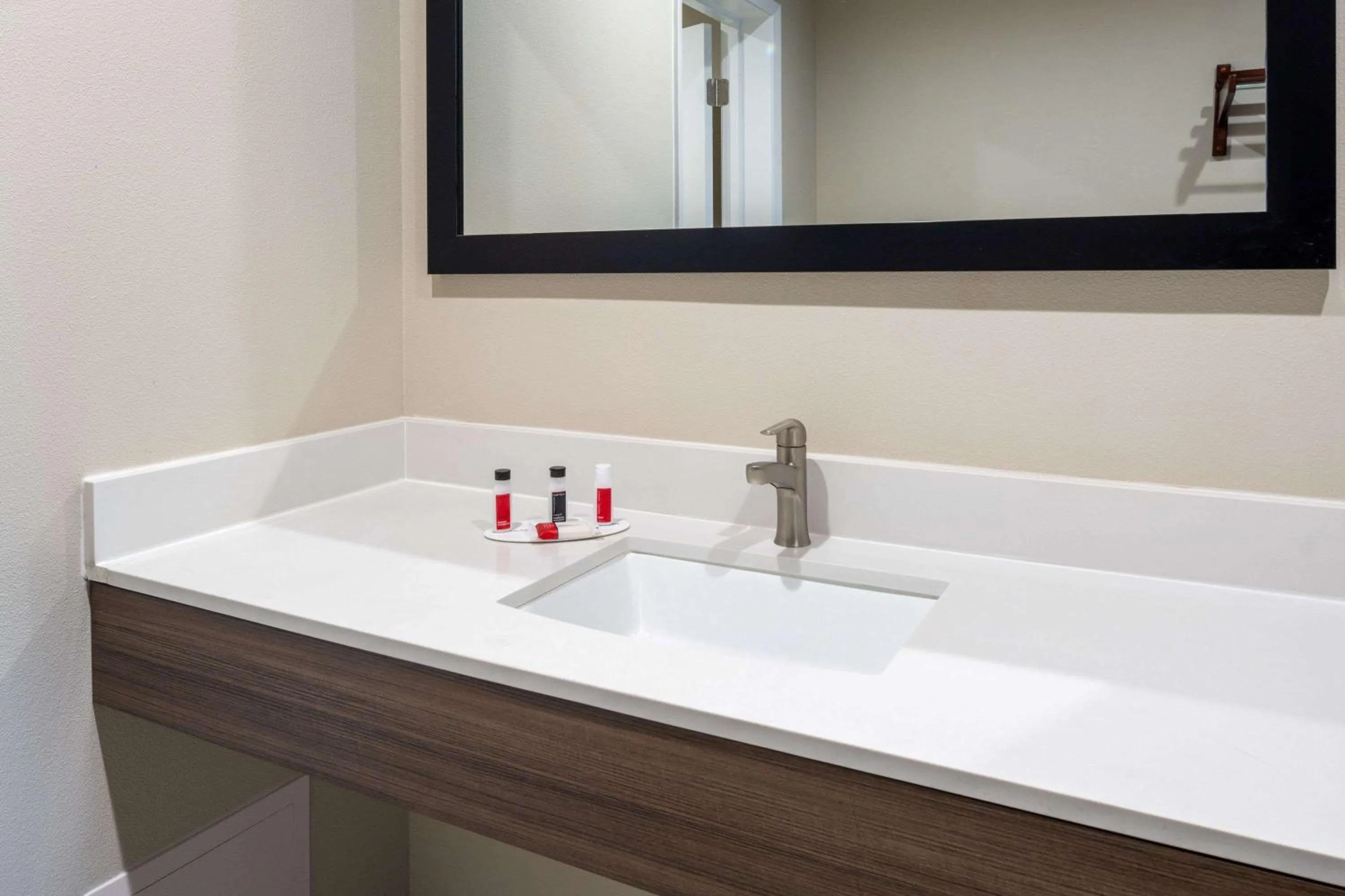 Bathroom in Ramada by Wyndham Modesto Yosemite Area