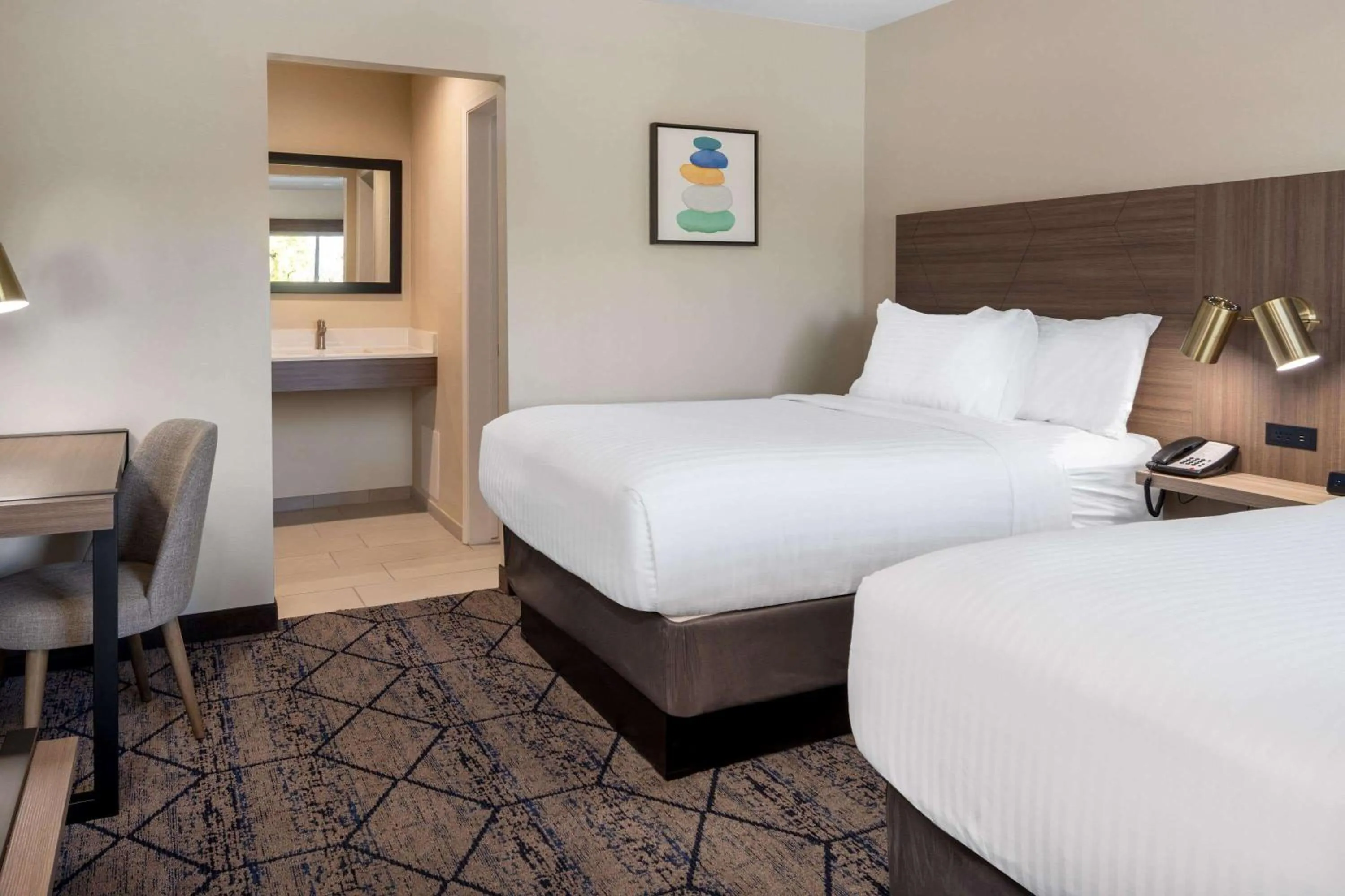 Photo of the whole room, Bed in Ramada by Wyndham Modesto Yosemite Area