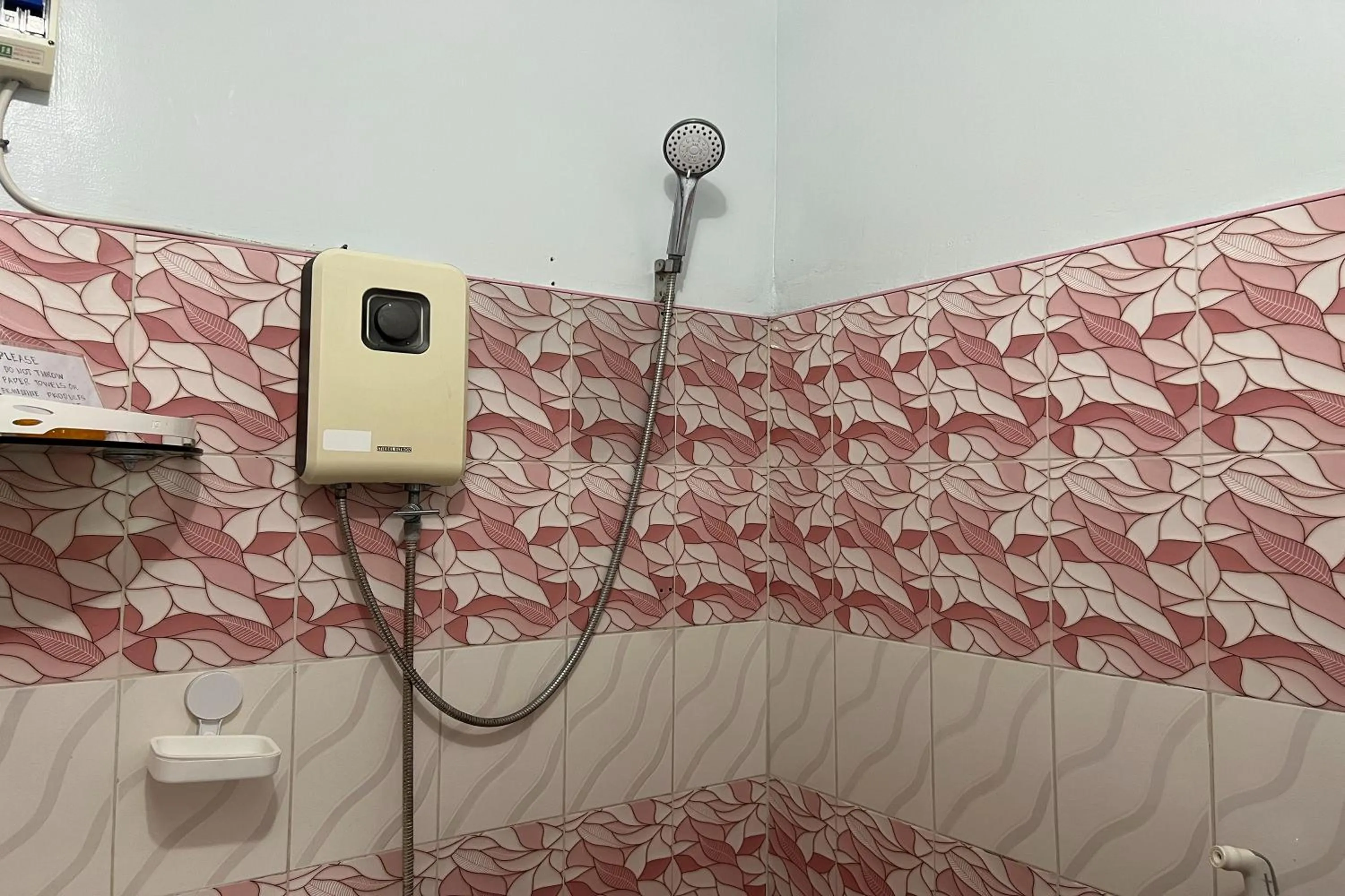 Bathroom in FNT Transient House near Hundred Islands