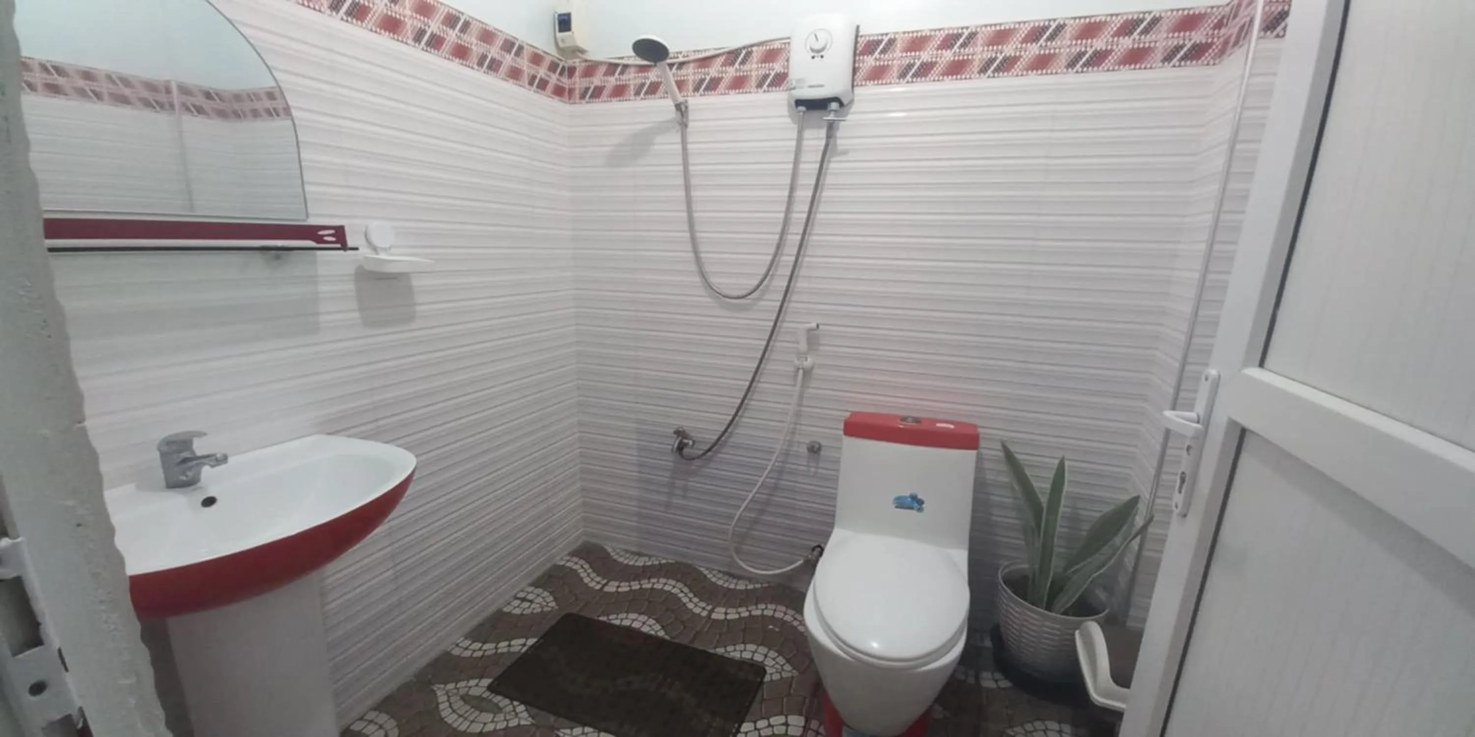 Bathroom in FNT Transient House near Hundred Islands