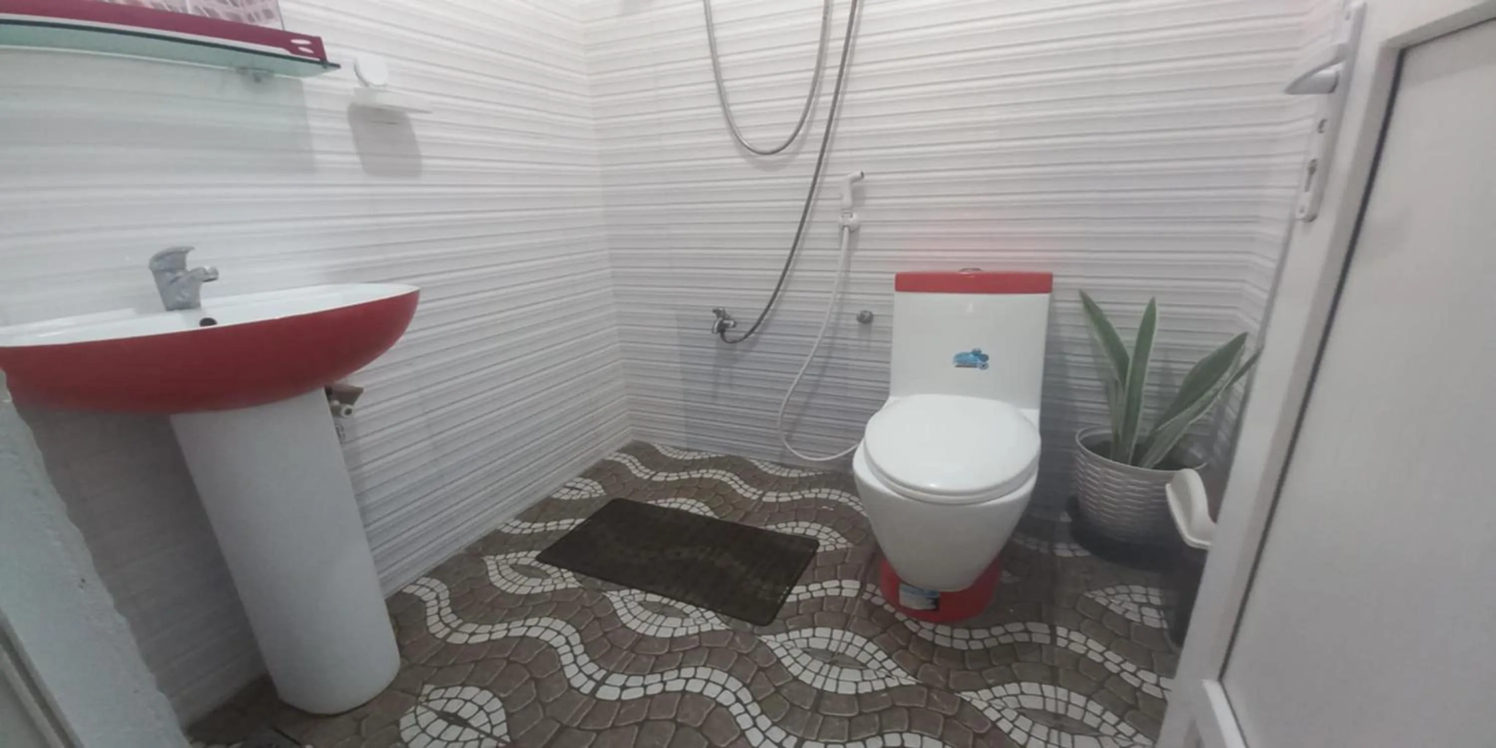 Bathroom in FNT Transient House near Hundred Islands