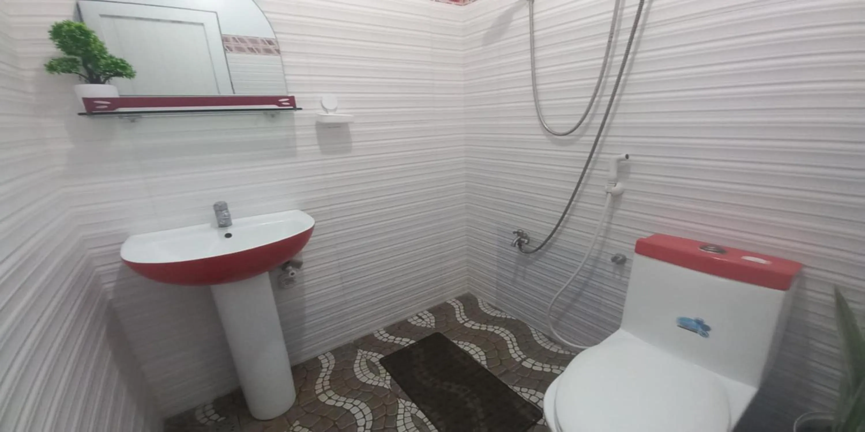 Bathroom in FNT Transient House near Hundred Islands