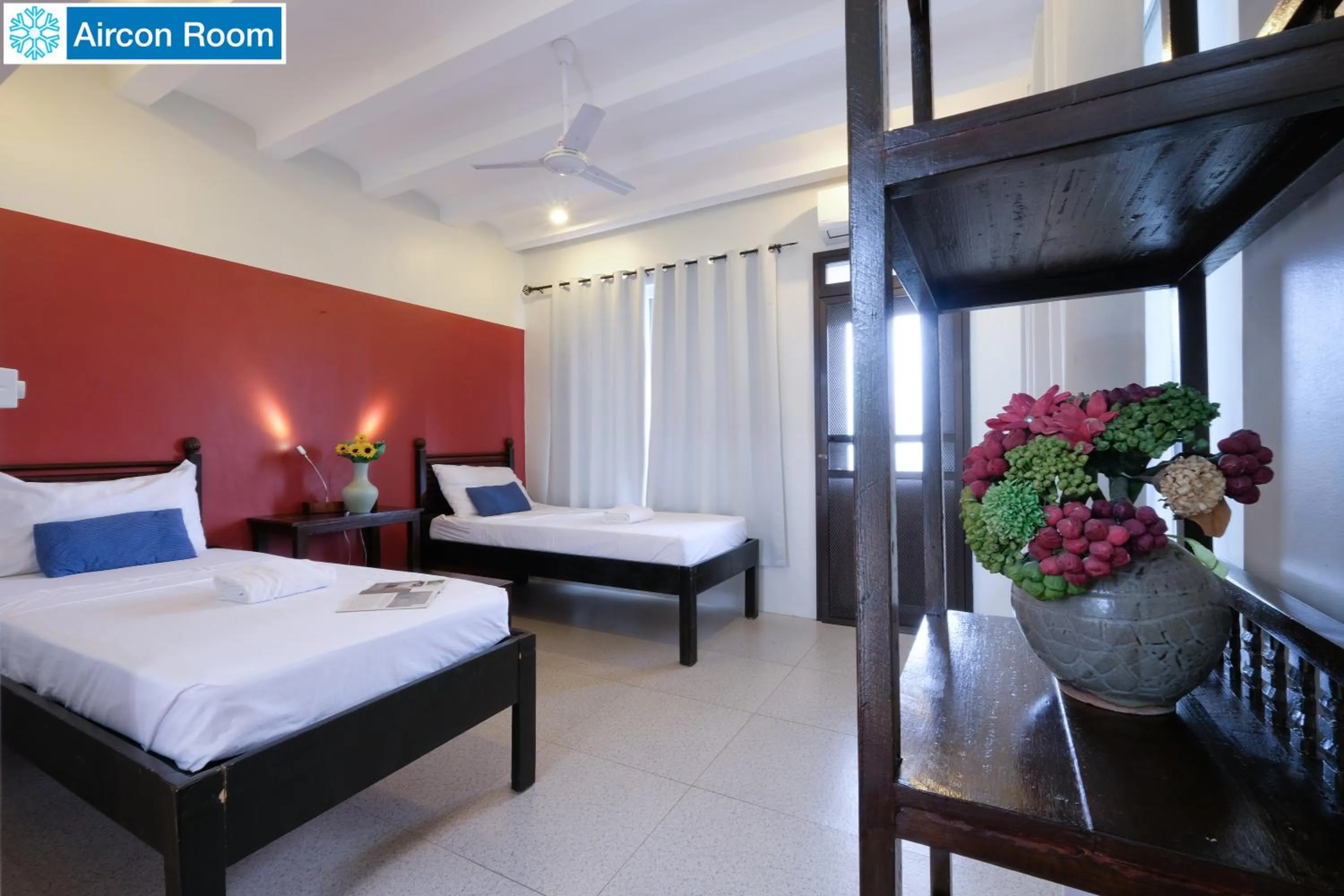 Bed in The Duyan House at Sinagtala Resort