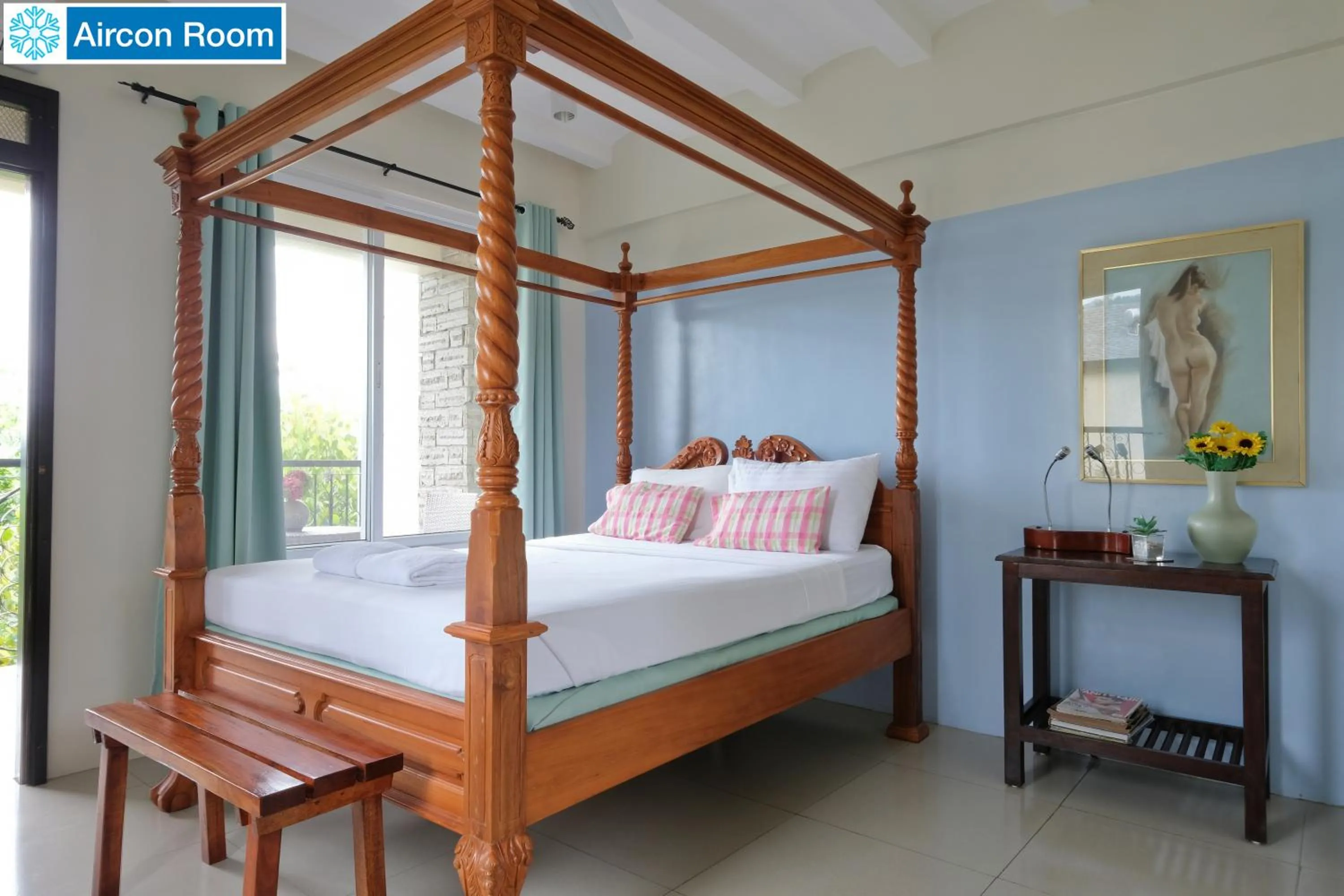 Bed in The Duyan House at Sinagtala Resort