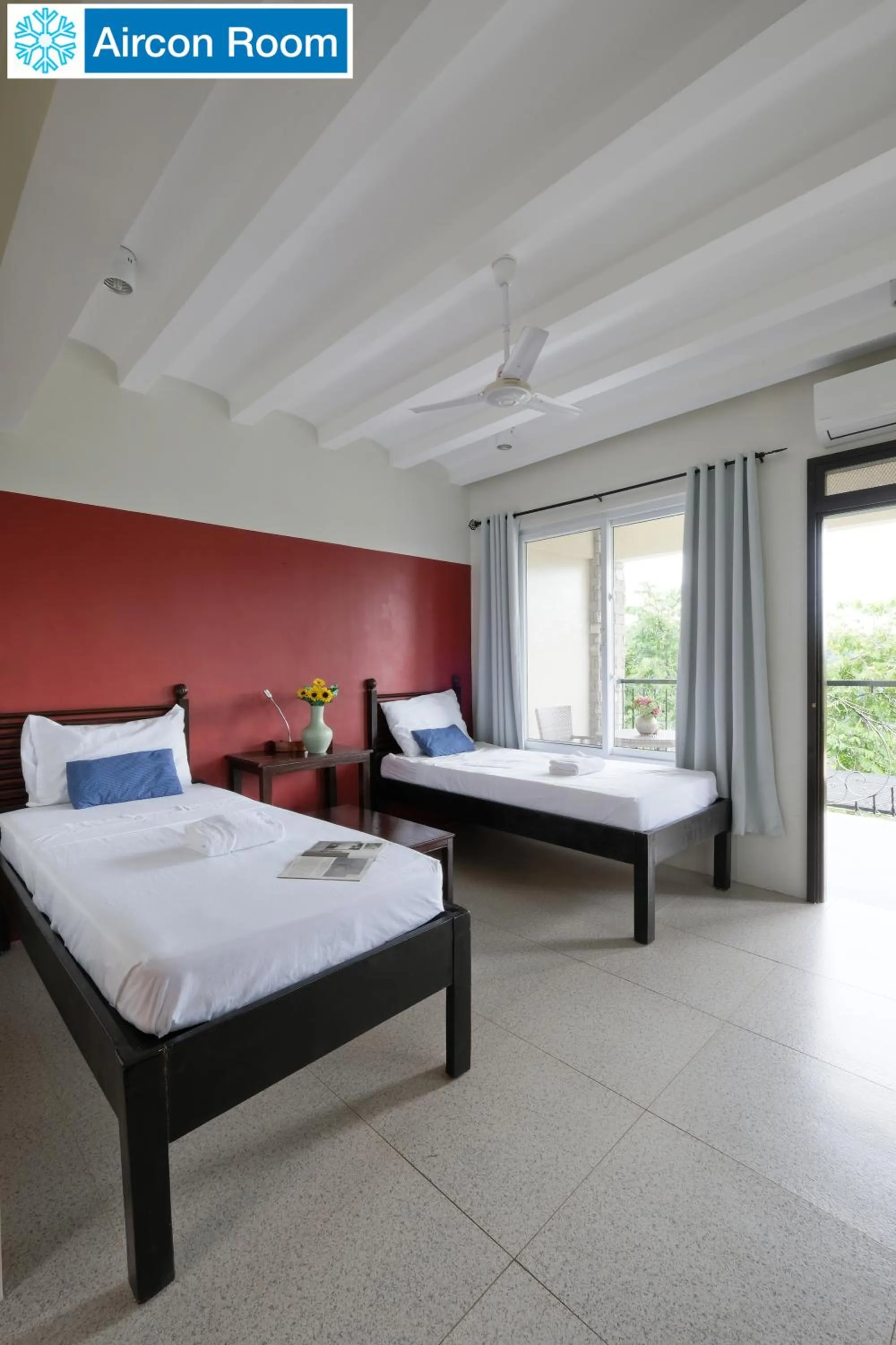 Bed in The Duyan House at Sinagtala Resort