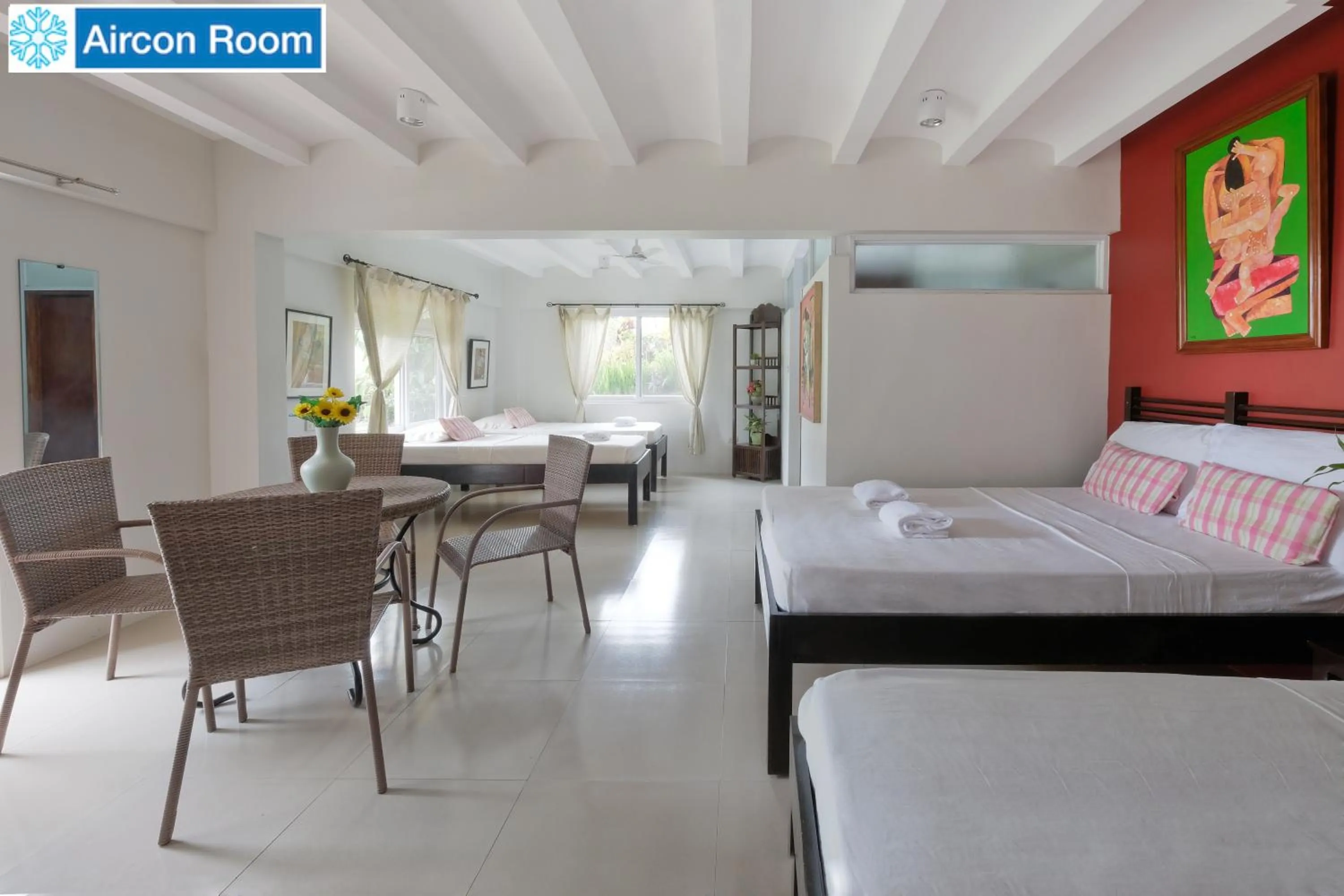 Bed in The Duyan House at Sinagtala Resort