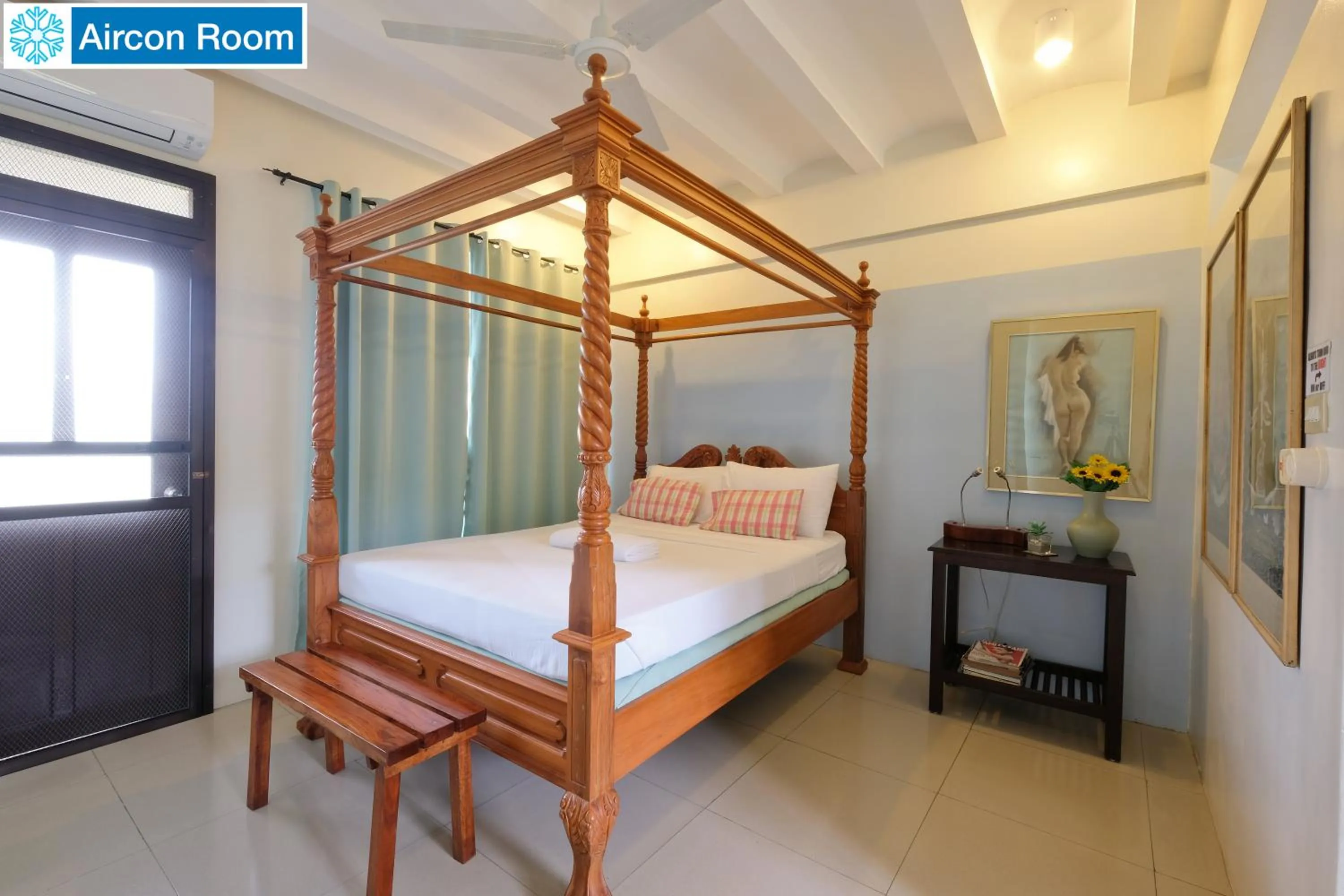 Bed in The Duyan House at Sinagtala Resort