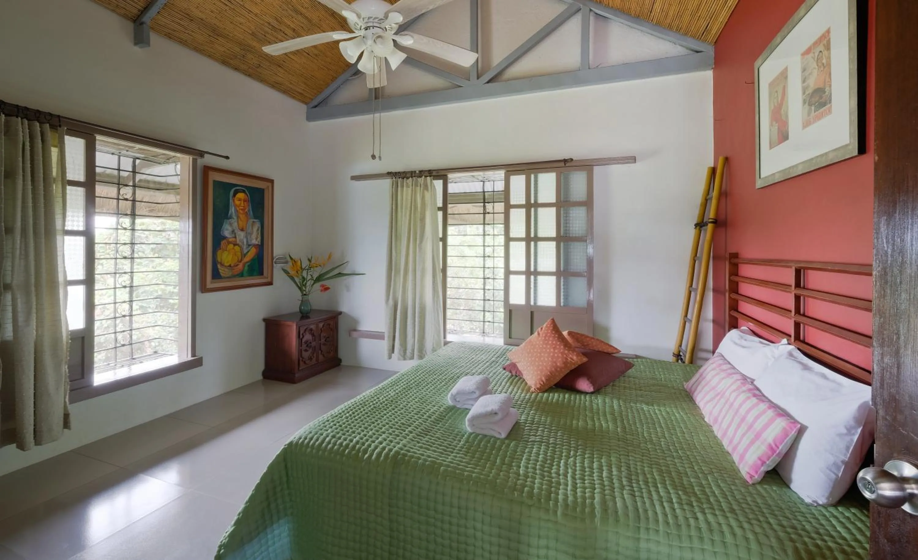 Bed in The Duyan House at Sinagtala Resort