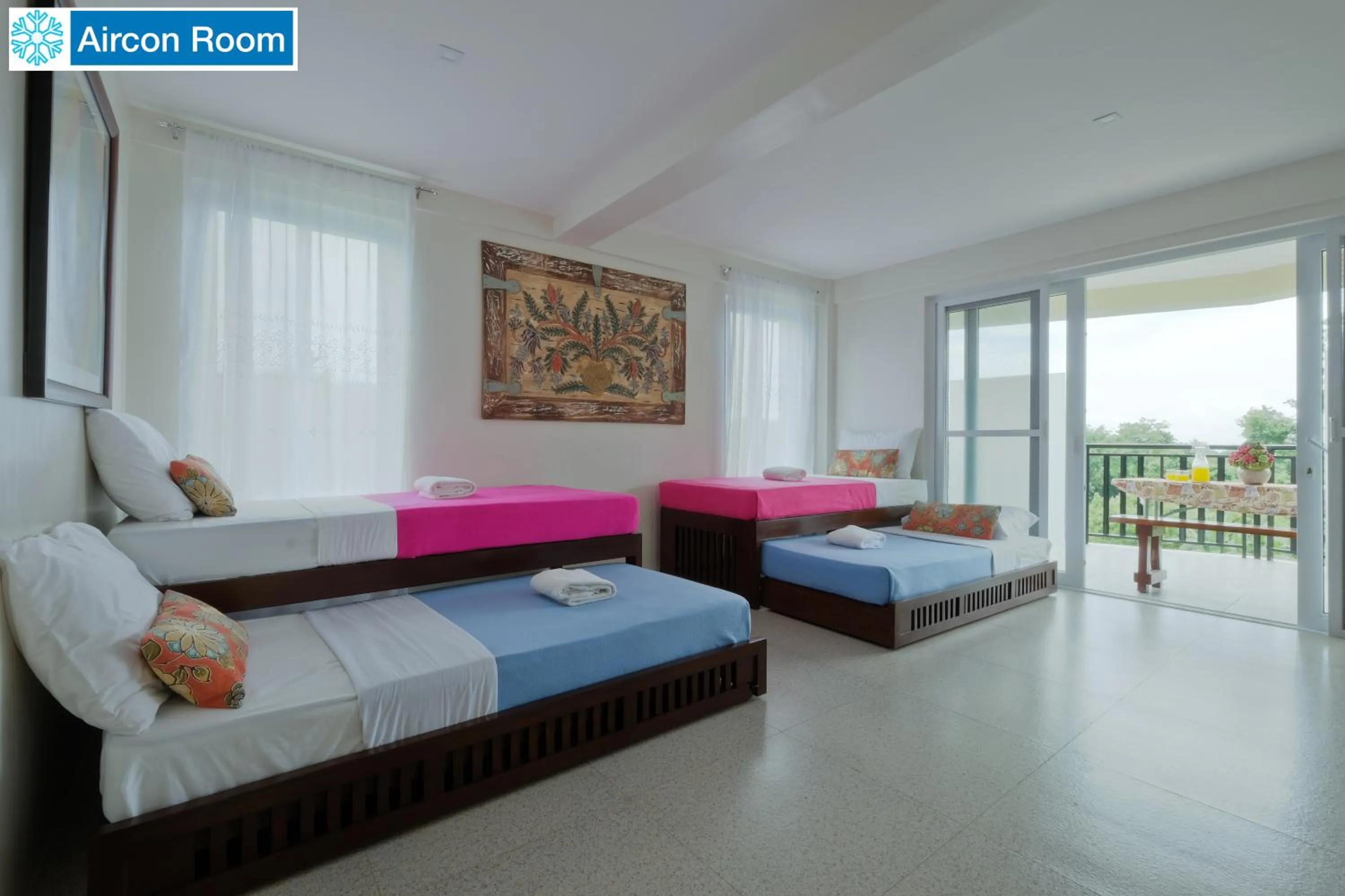 Bed in The Duyan House at Sinagtala Resort