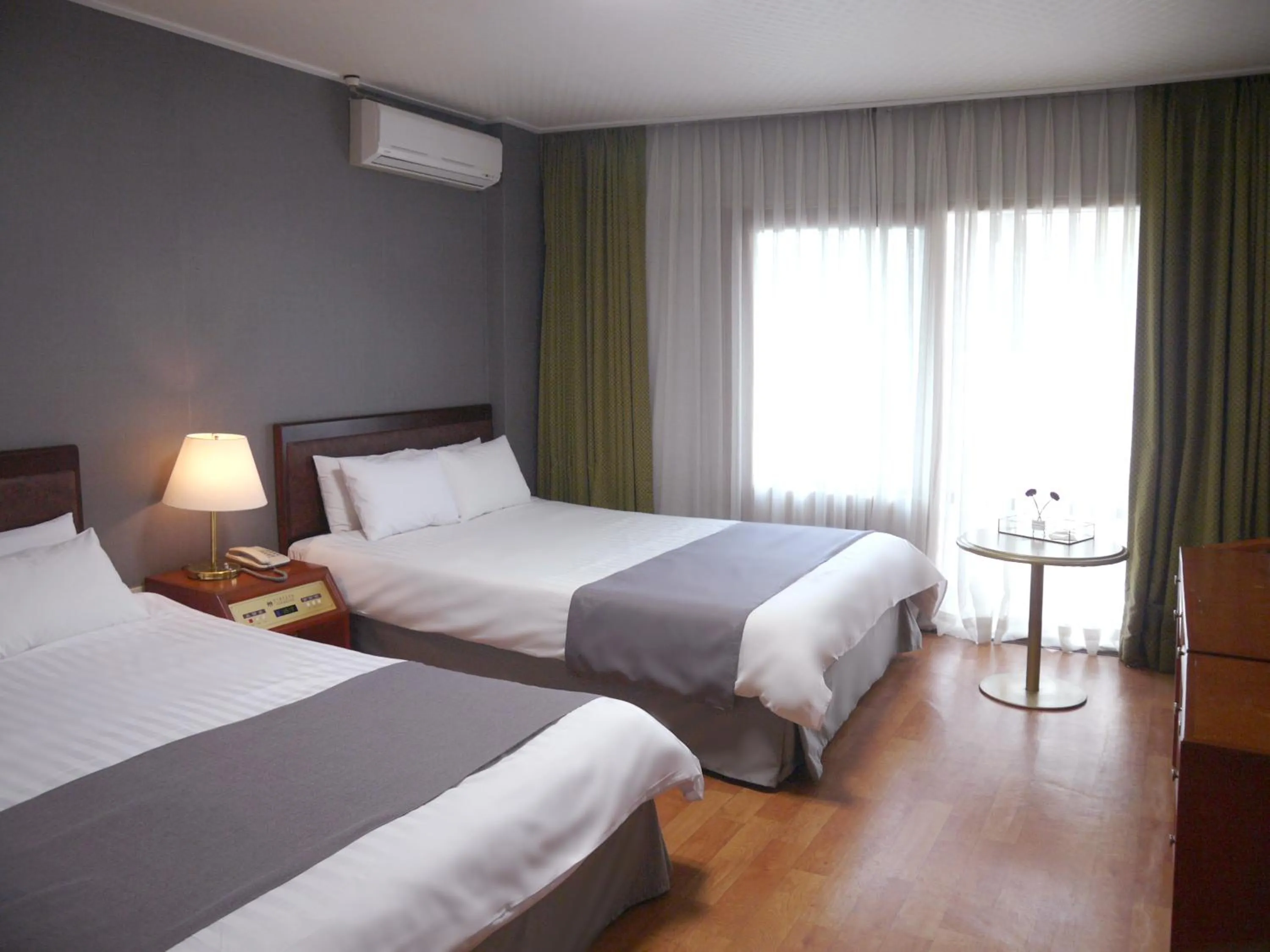 Bed in Pearl Hotel Jeju