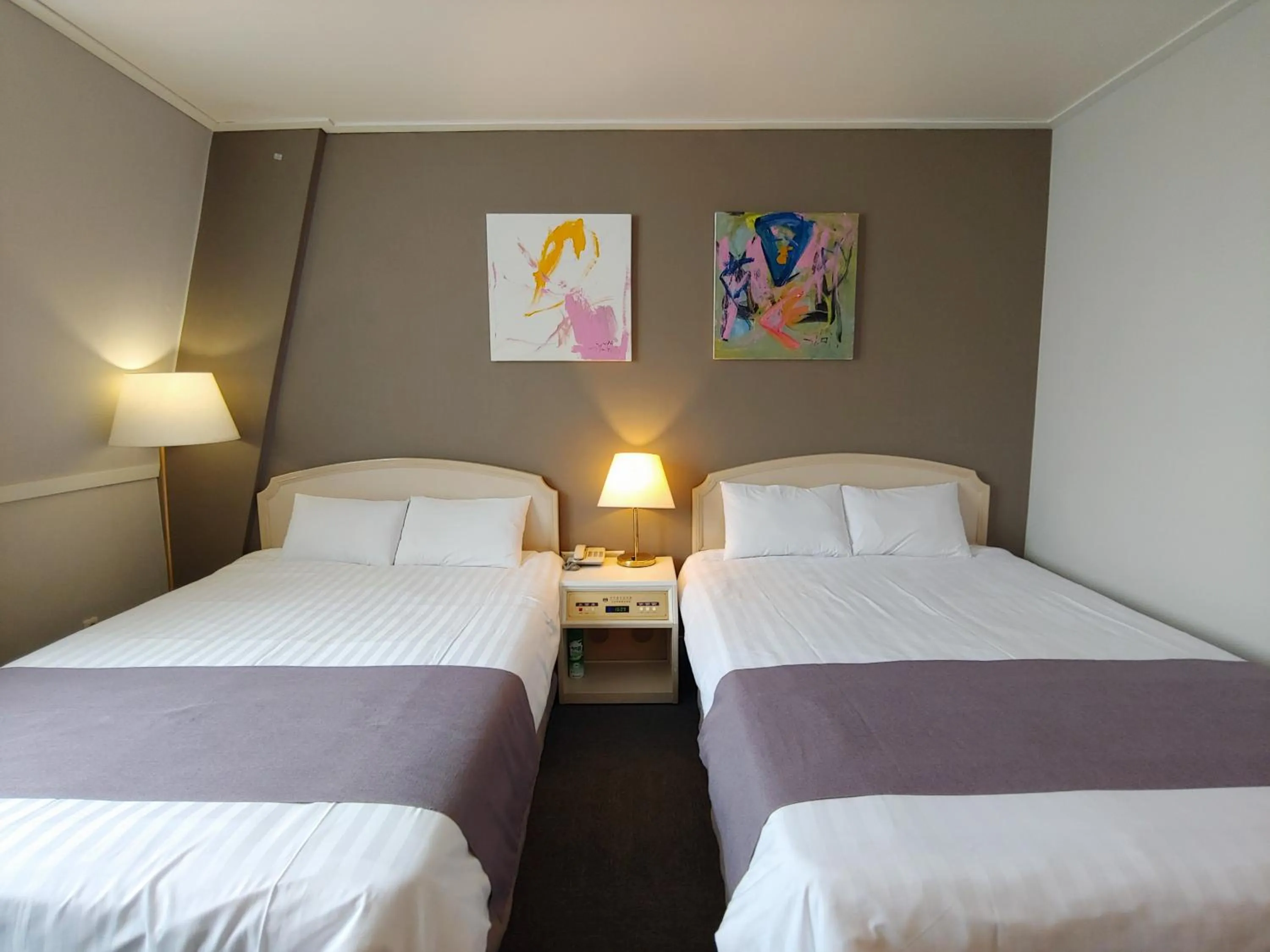 Bed in Pearl Hotel Jeju