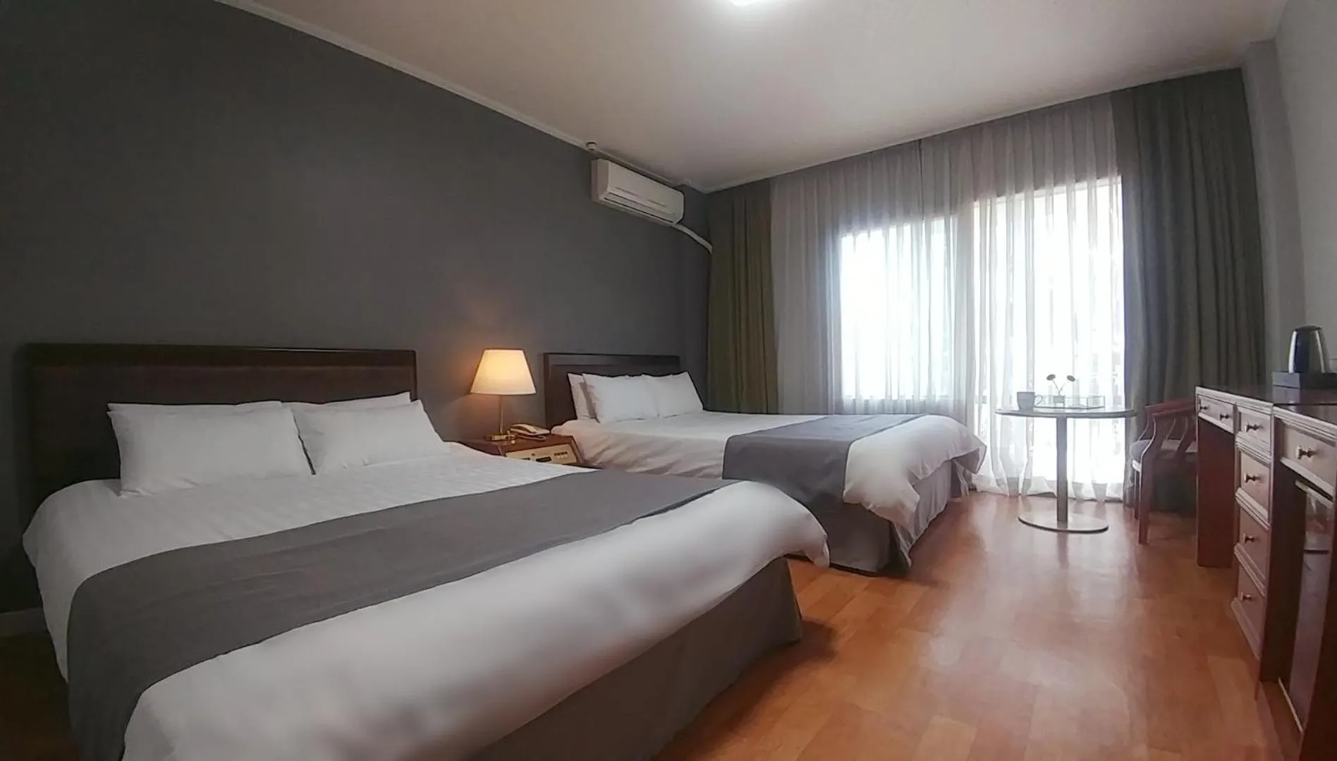 Bed in Pearl Hotel Jeju