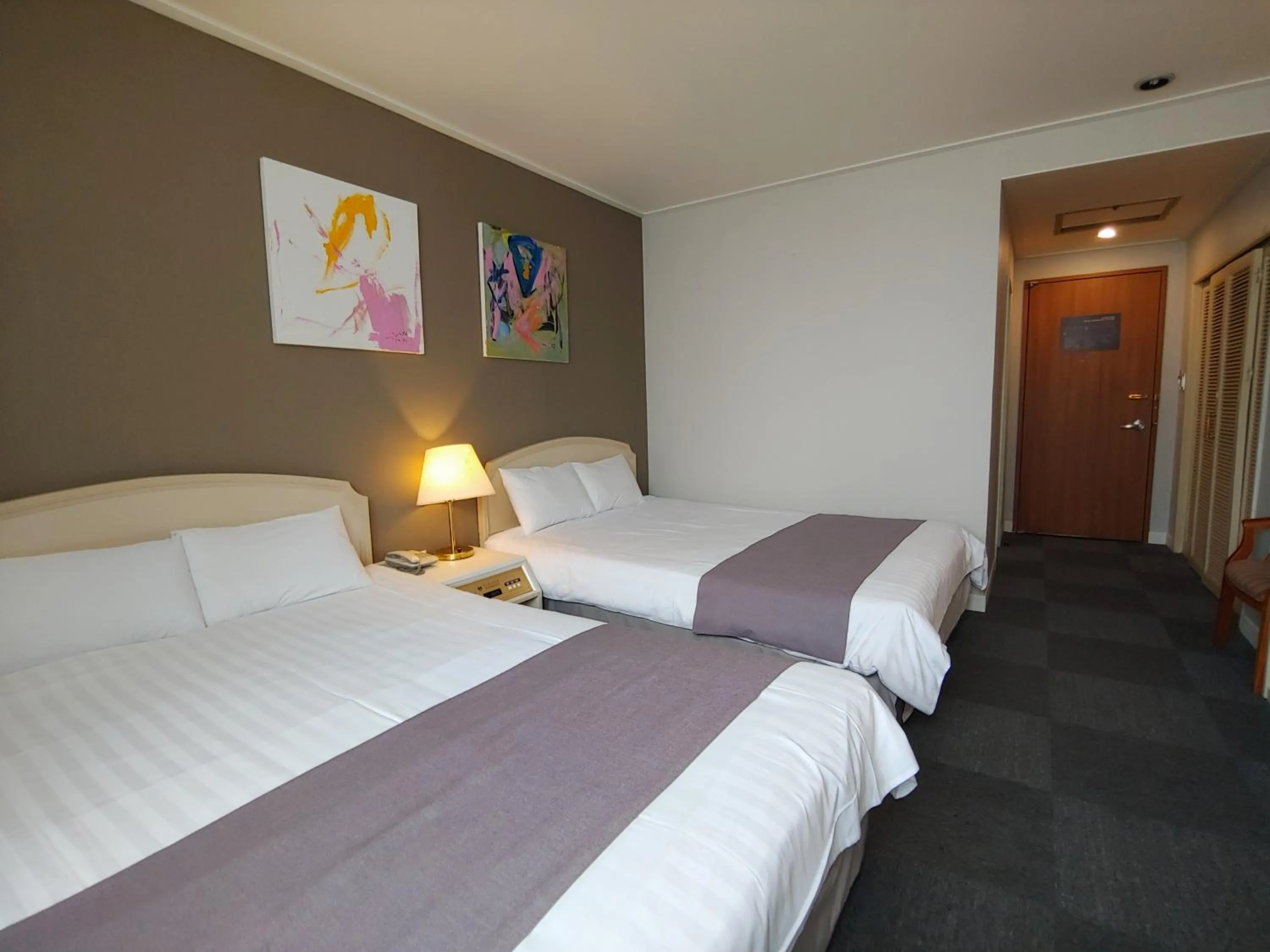 Bed in Pearl Hotel Jeju