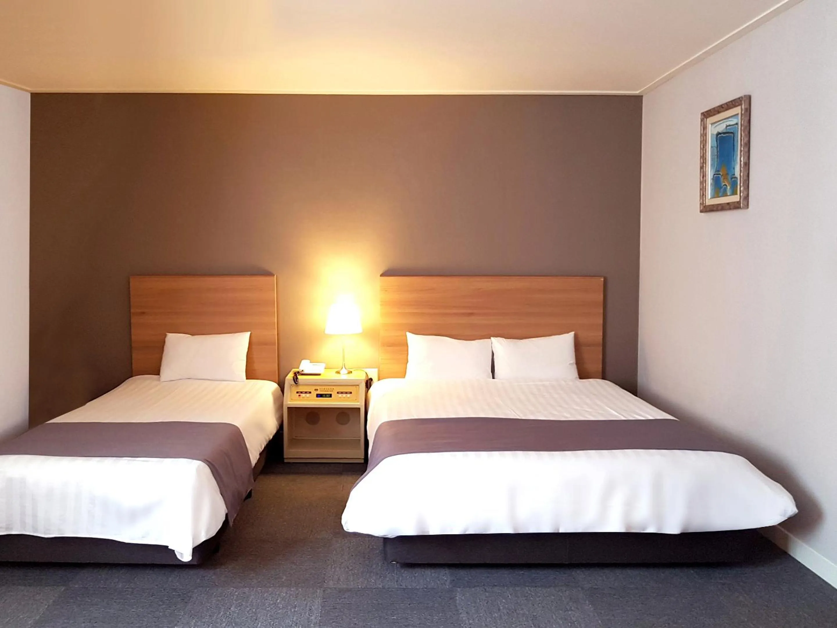 Bed in Pearl Hotel Jeju