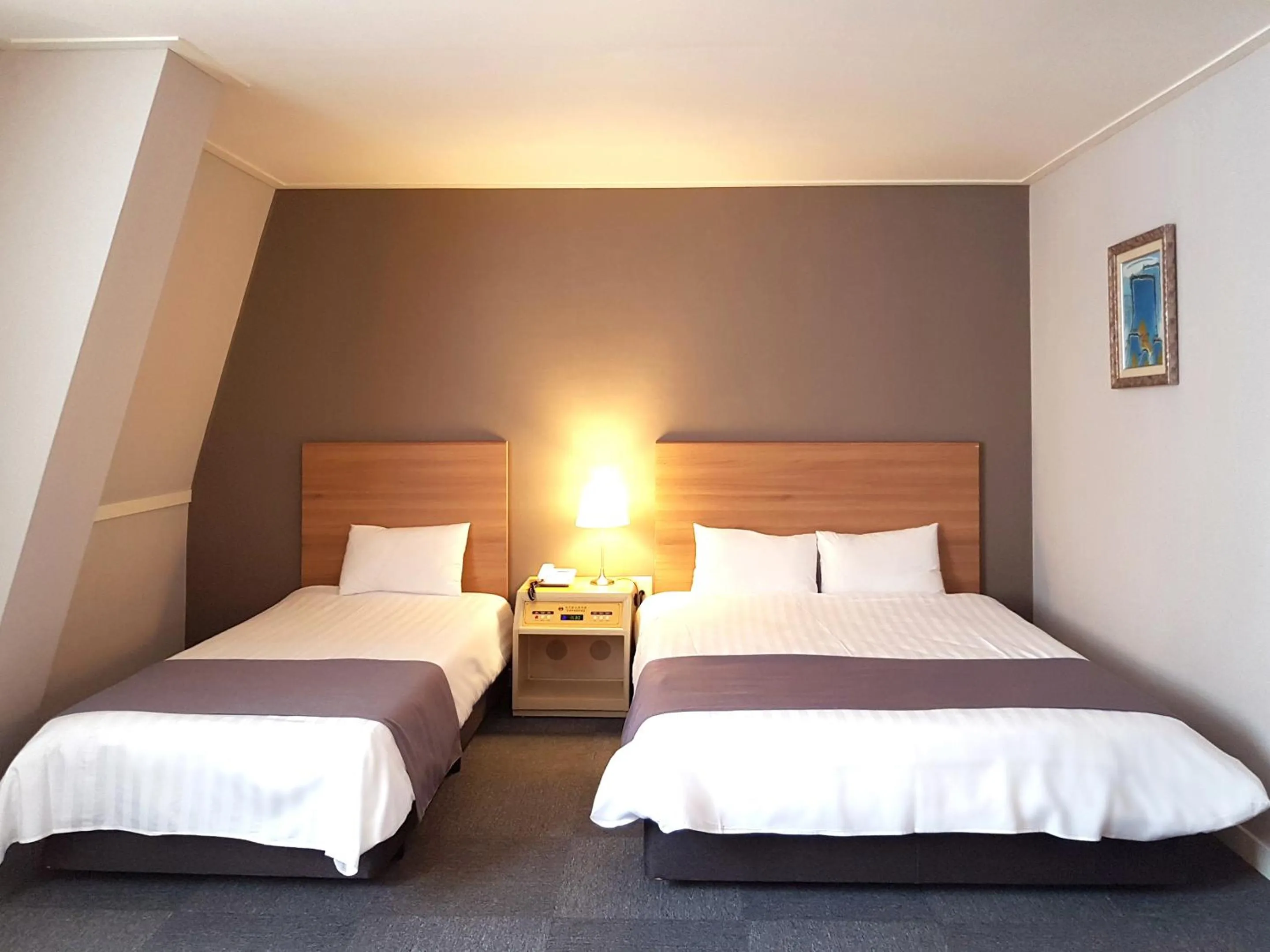 Bed in Pearl Hotel Jeju