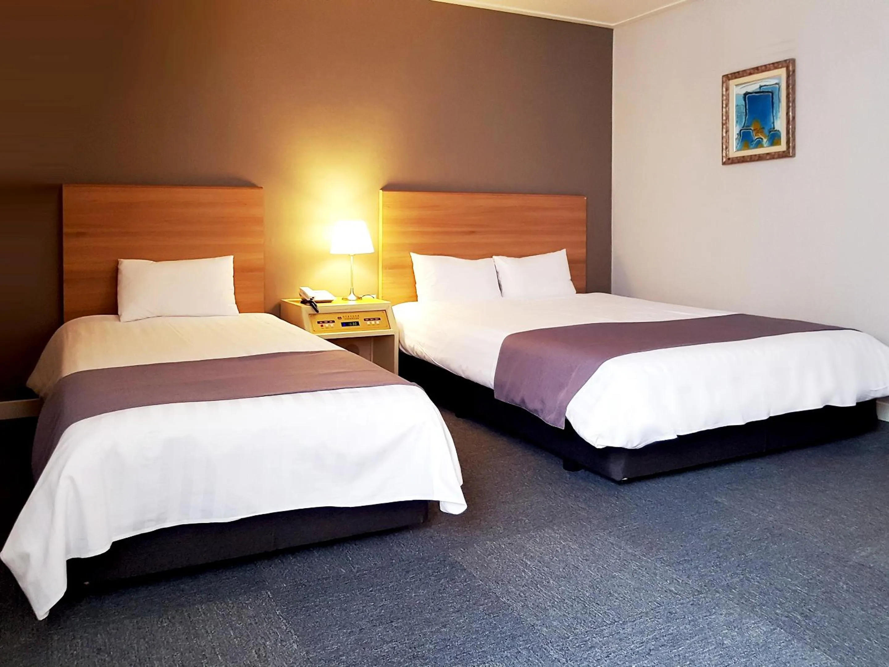 Bed in Pearl Hotel Jeju