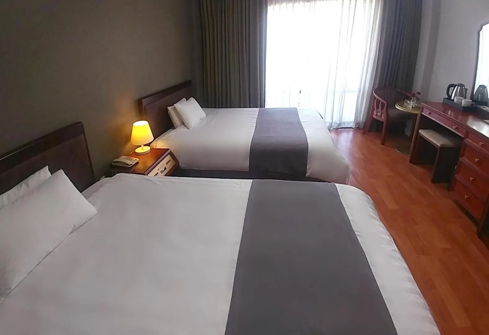 Bed in Pearl Hotel Jeju