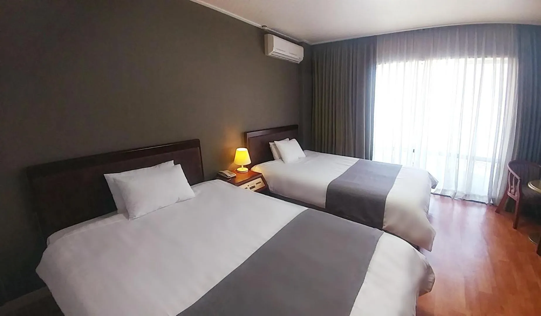 Bed in Pearl Hotel Jeju