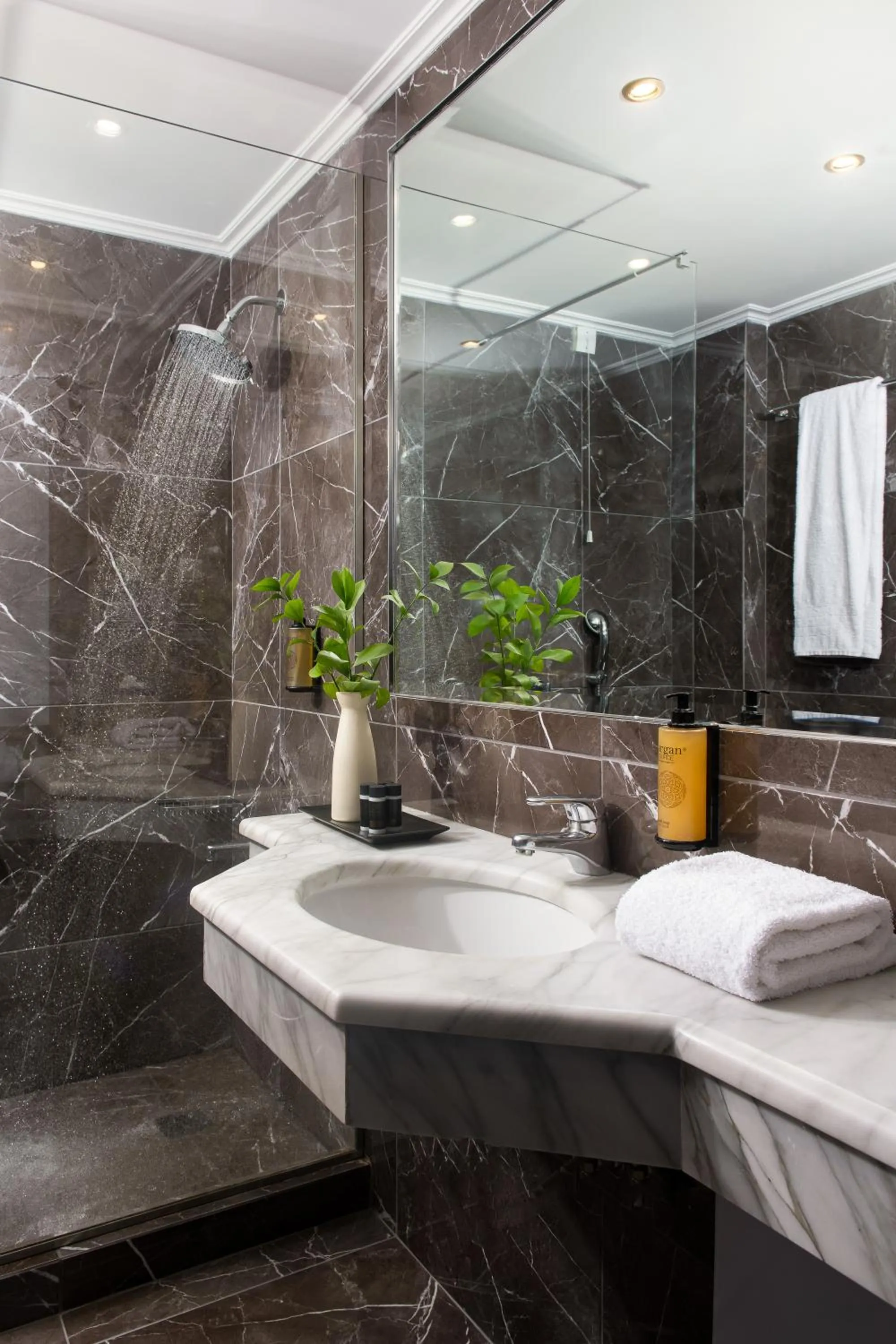 Bathroom in Athenian Riviera Hotel& Suites