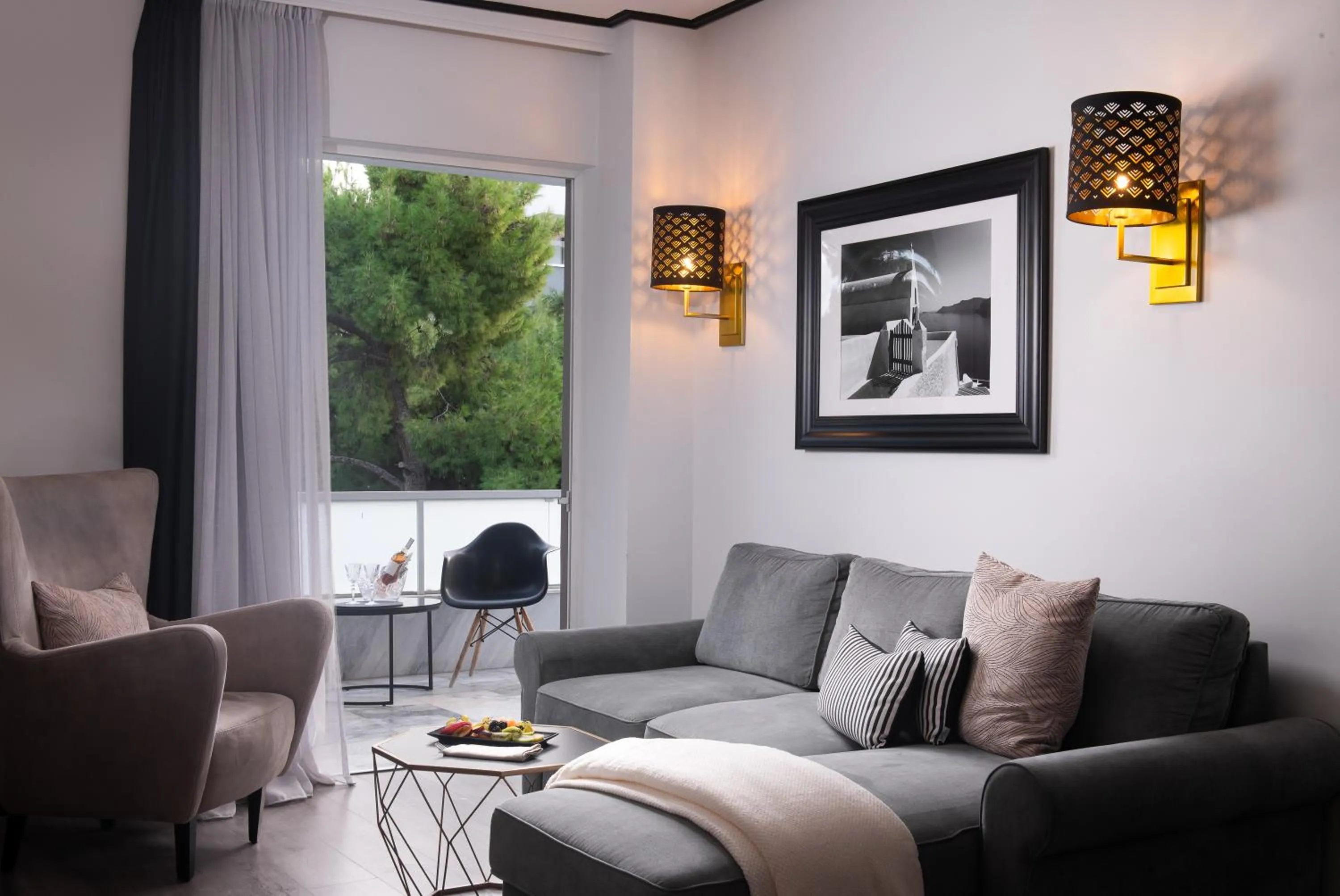 Seating area in Athenian Riviera Hotel& Suites