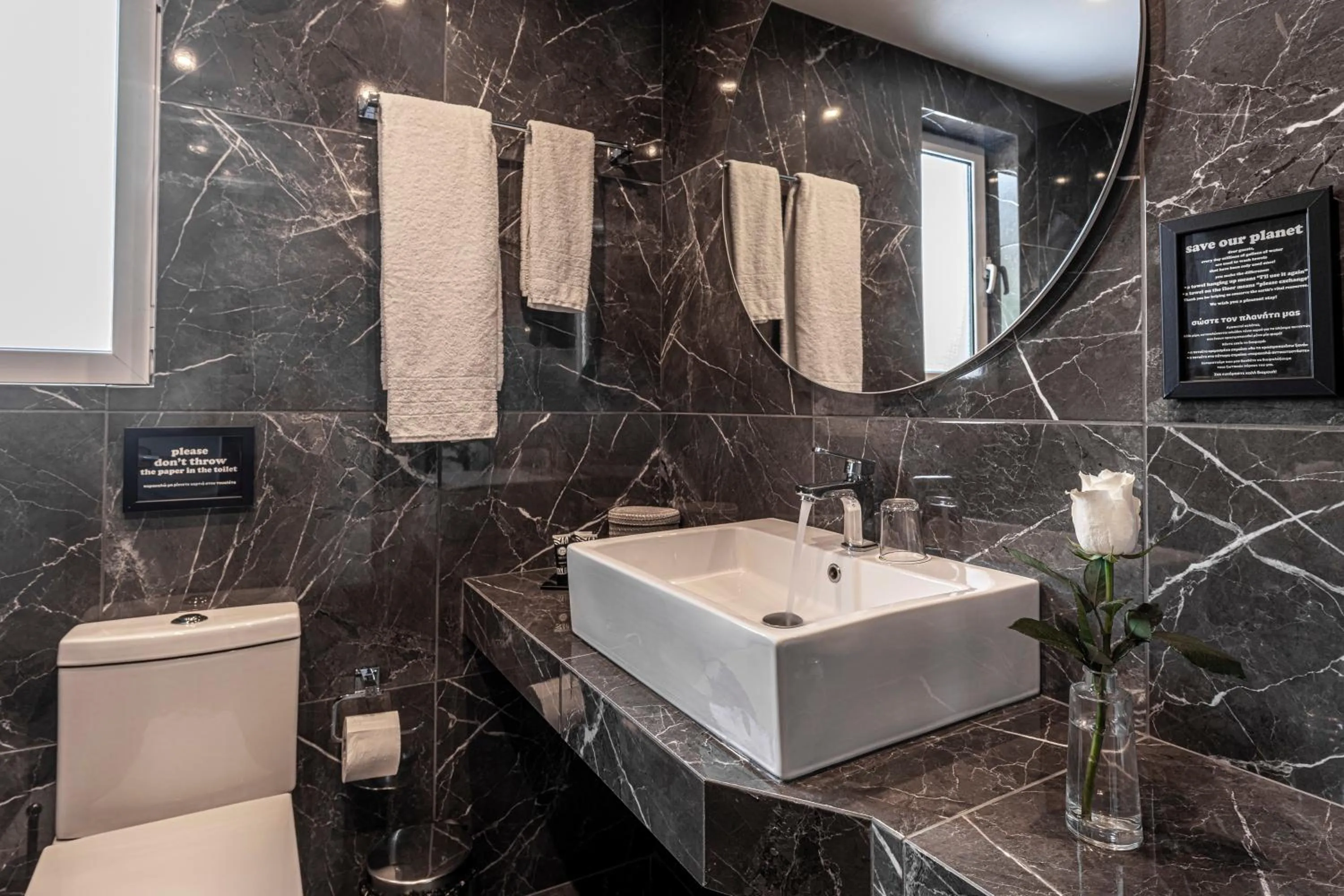 Bathroom in Athenian Riviera Hotel& Suites