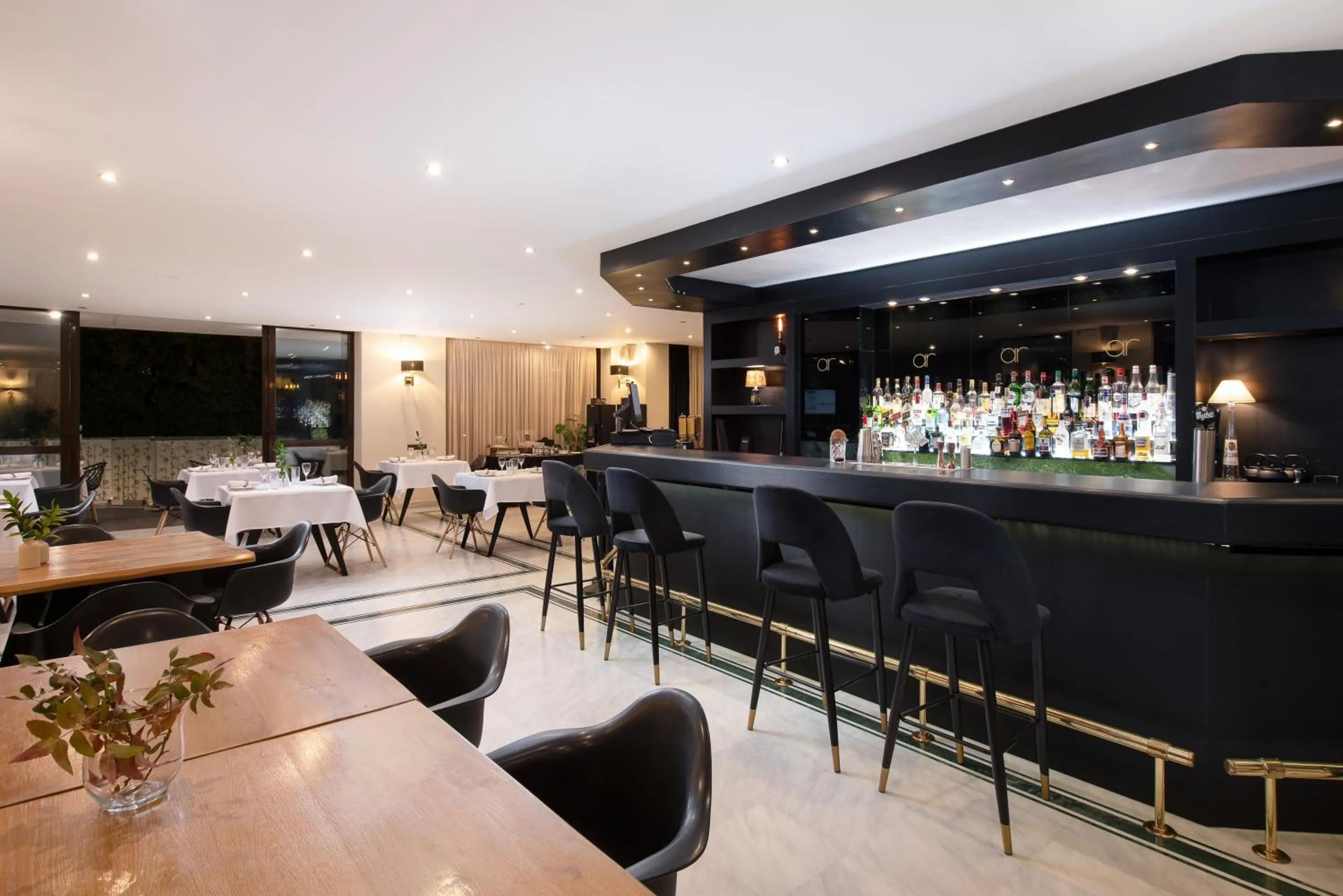 Lounge or bar in Athenian Riviera Hotel& Suites