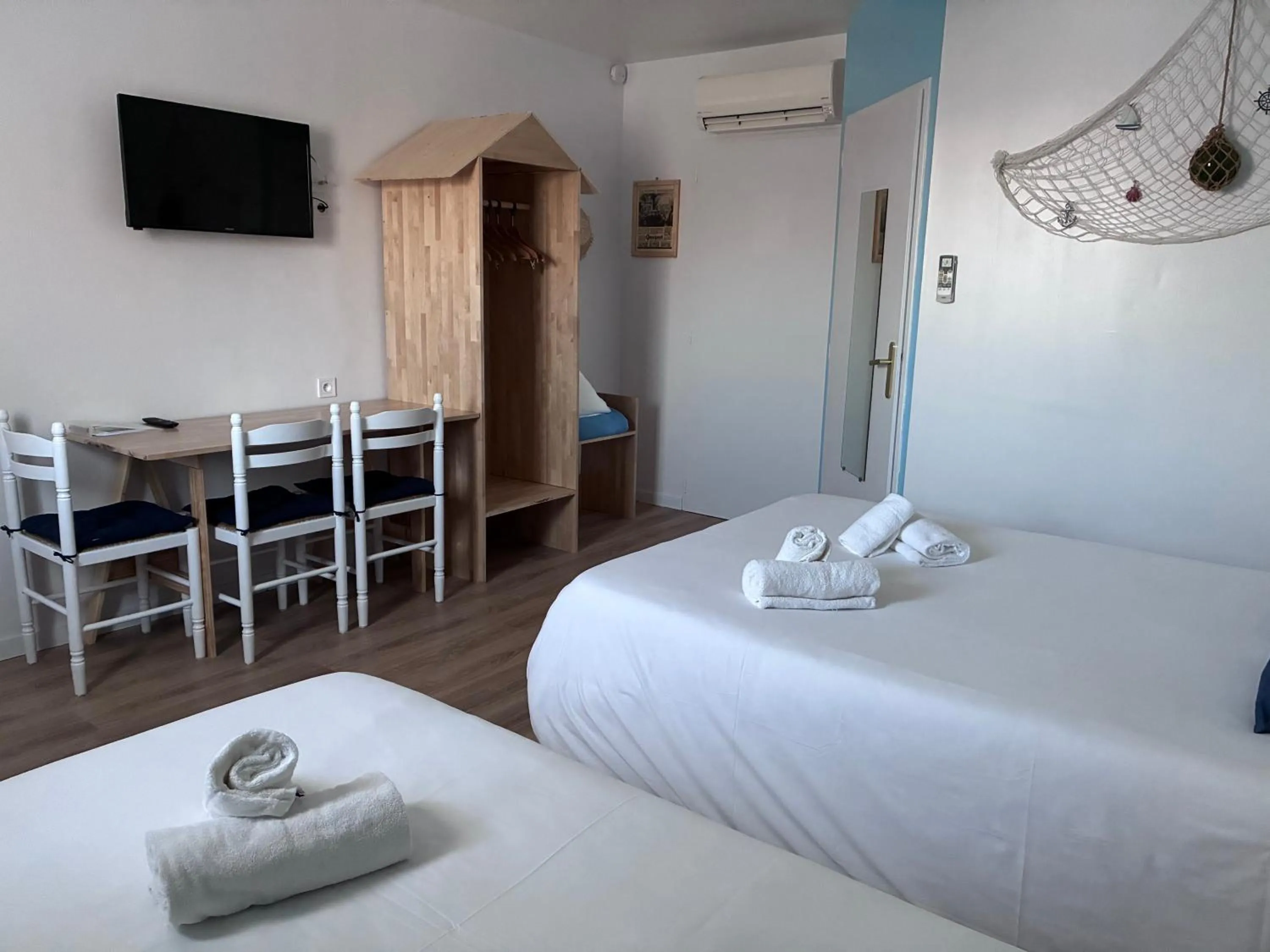 Bed in Hotel Marjolaine