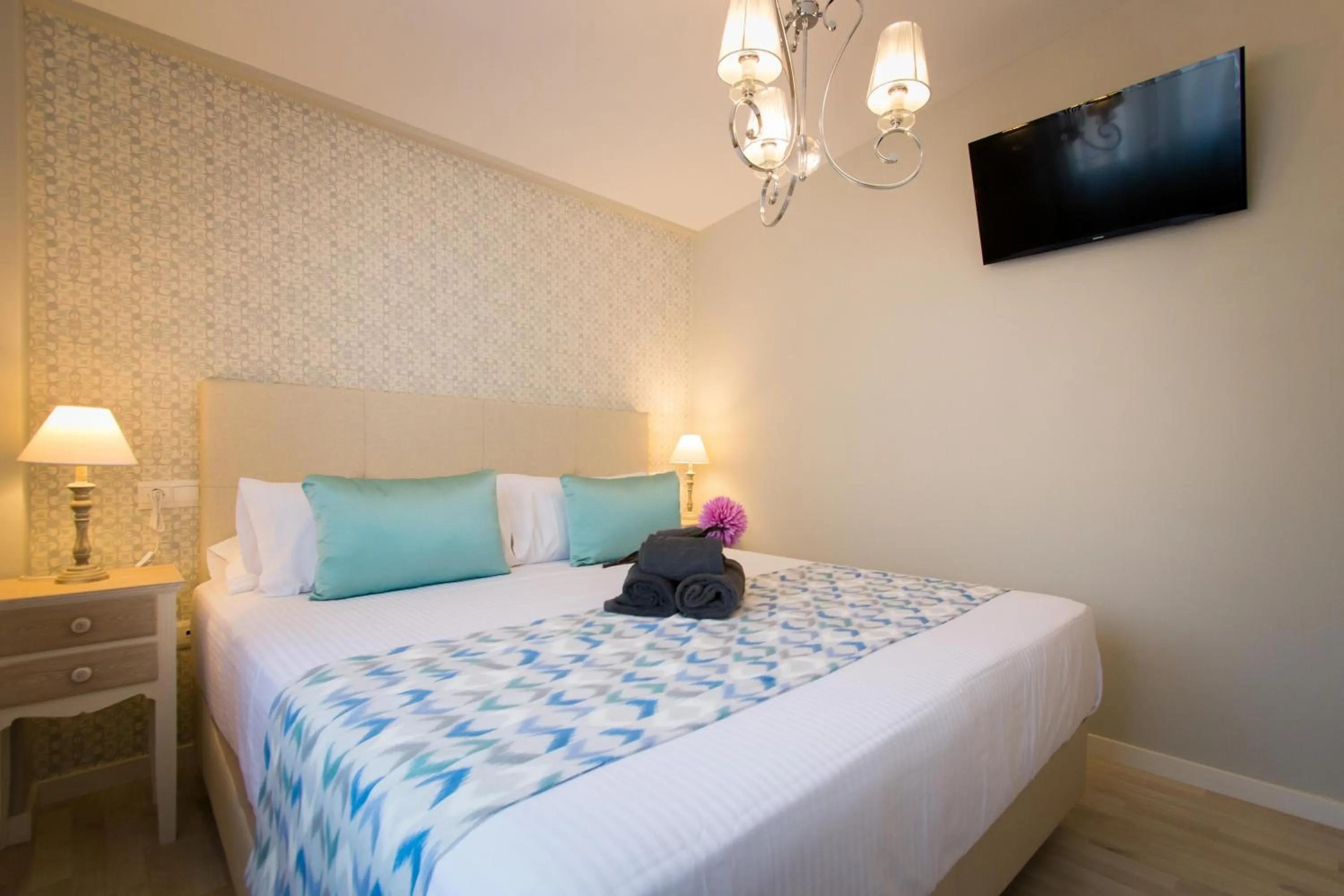 Bed in Holidays2Malaga Suites