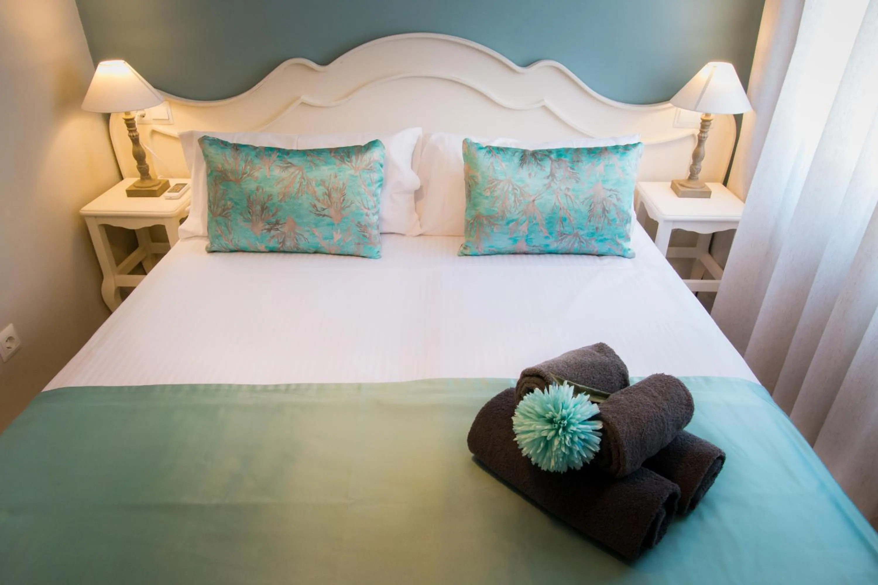 Bed in Holidays2Malaga Suites