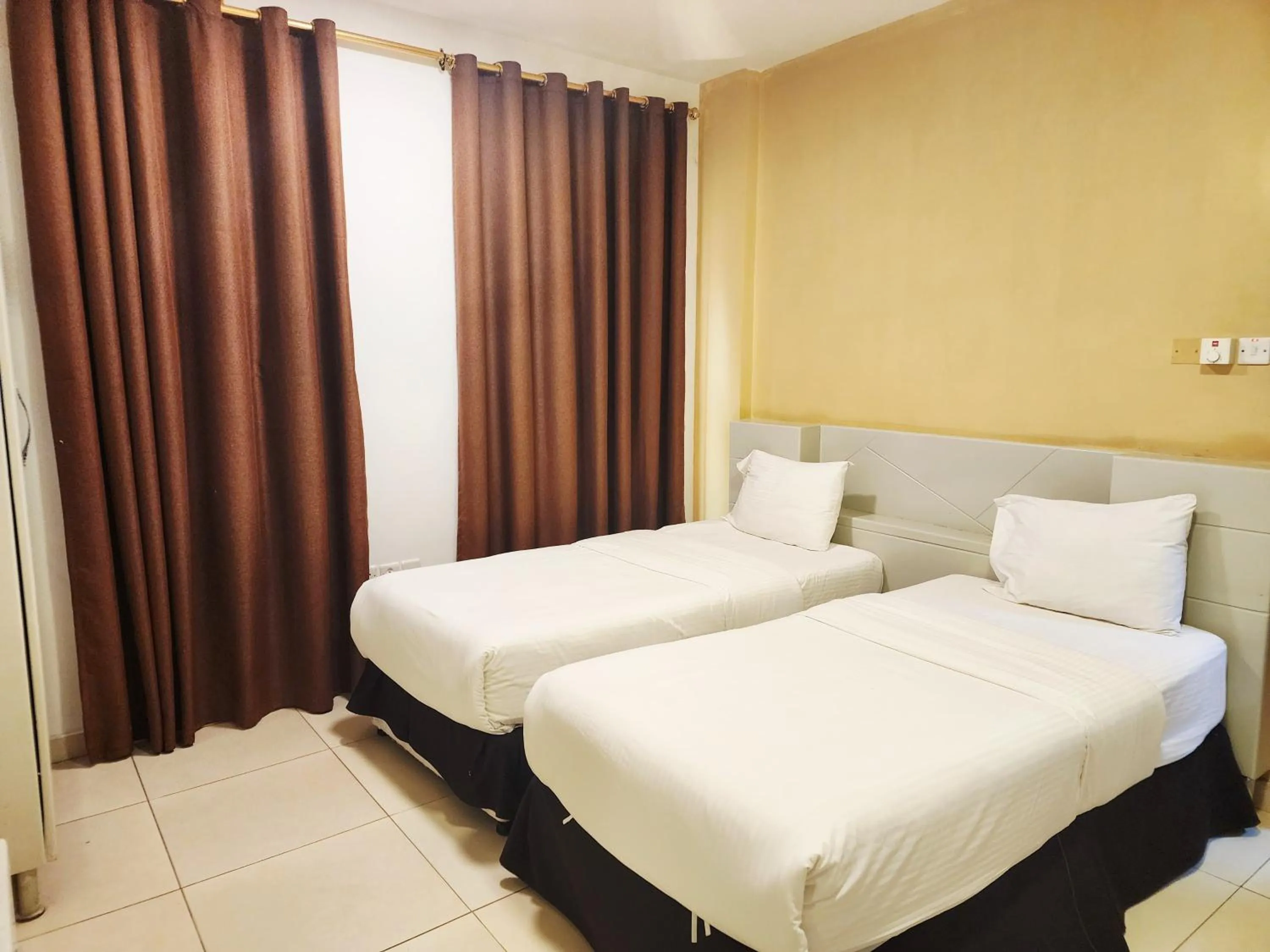 Bed in Star Emirates Inn Hotel Salalah