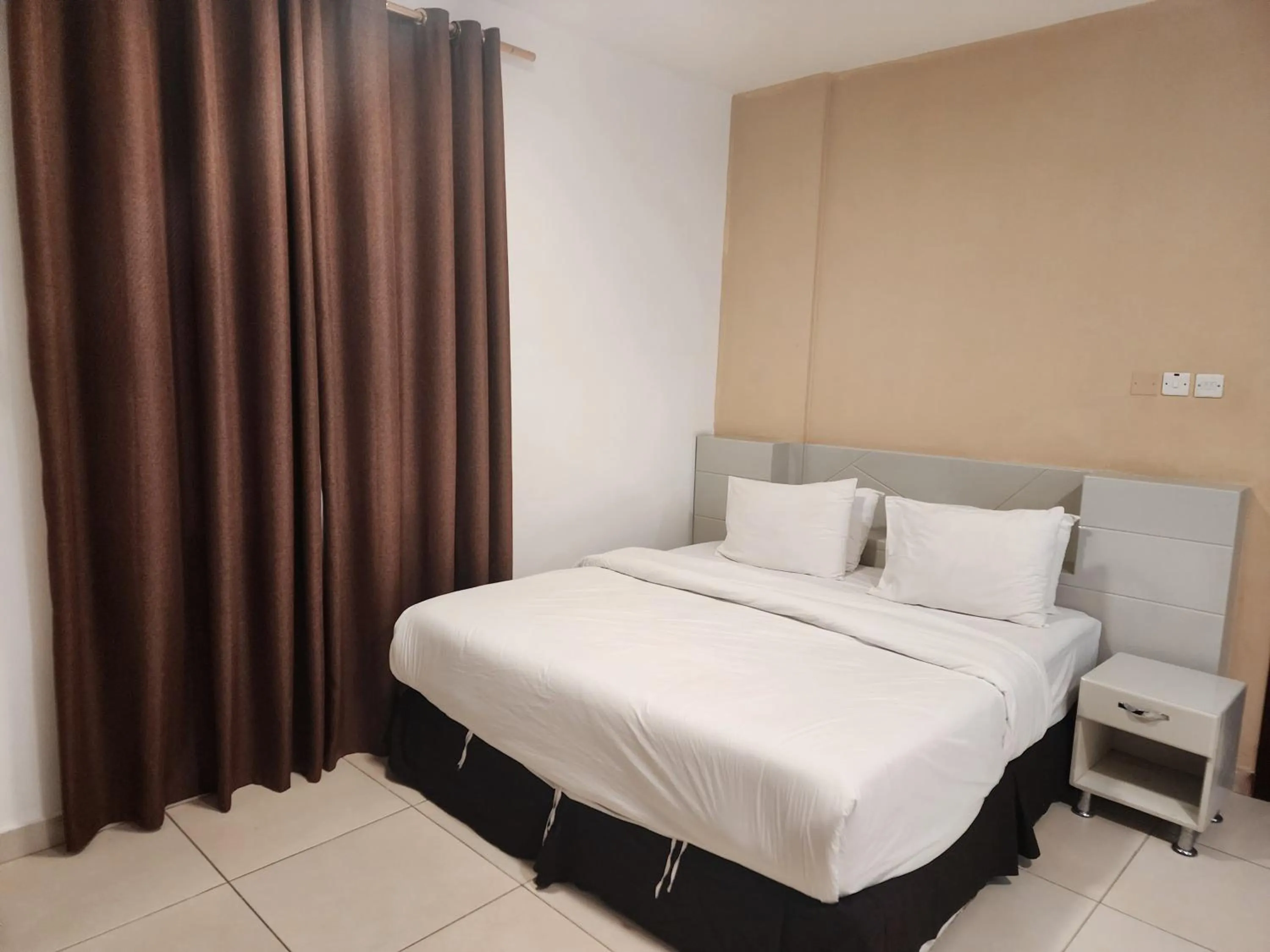 Bed in Star Emirates Inn Hotel Salalah