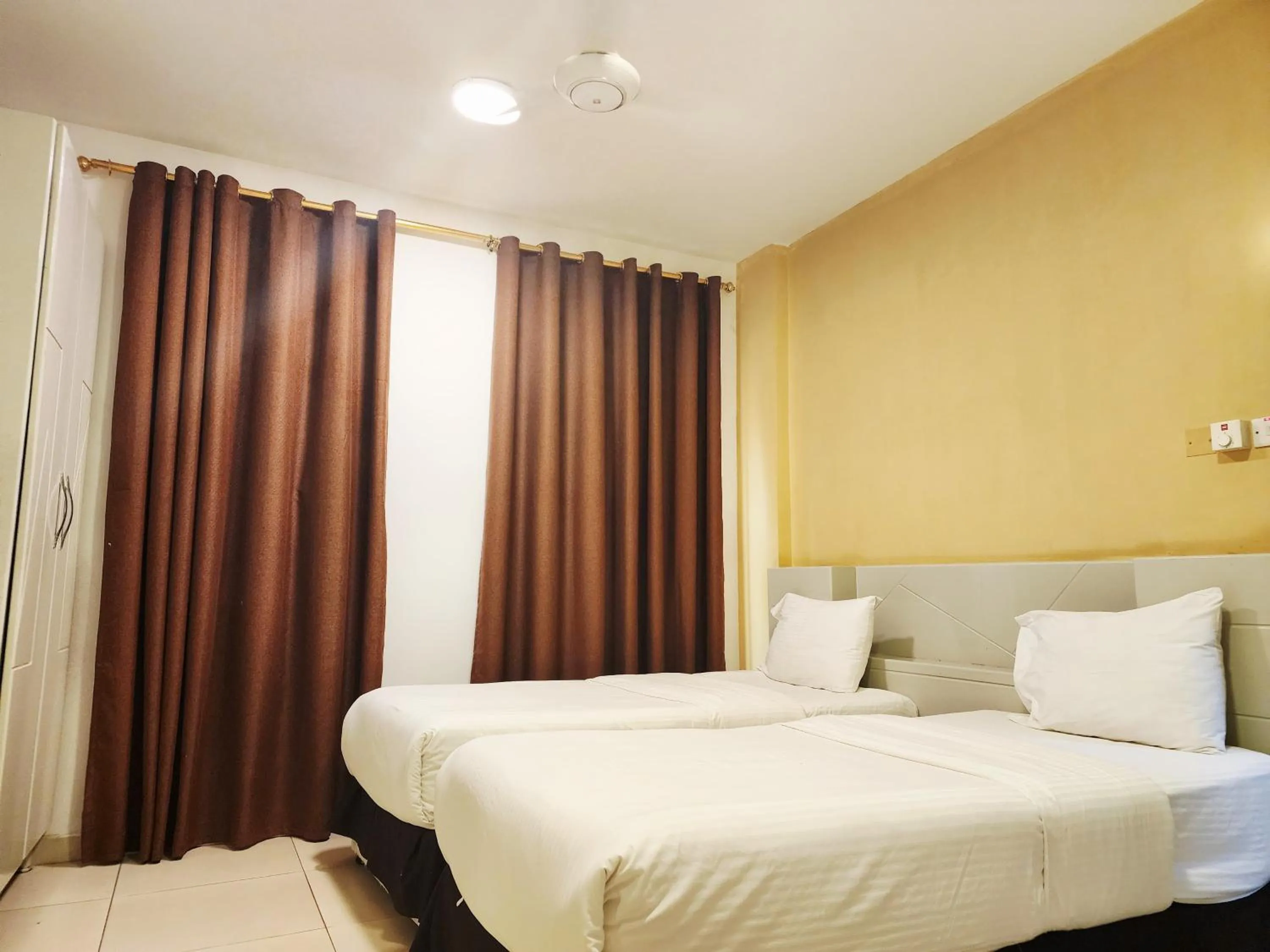 Bed in Star Emirates Inn Hotel Salalah