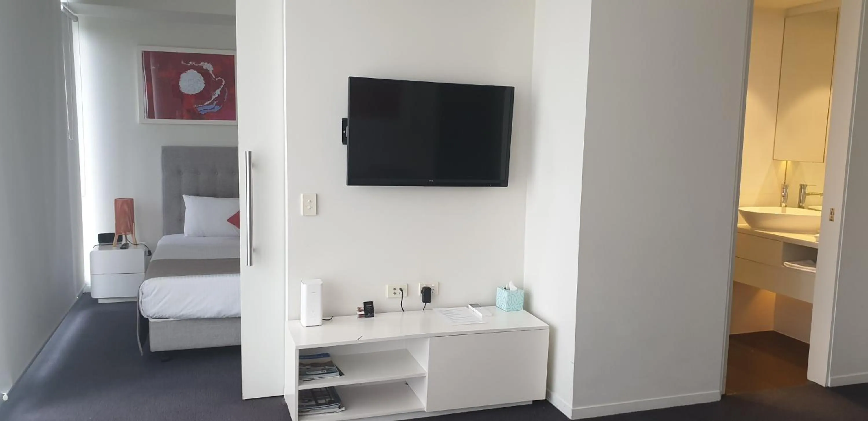 Bed in Tasha's Apartments on Warwick