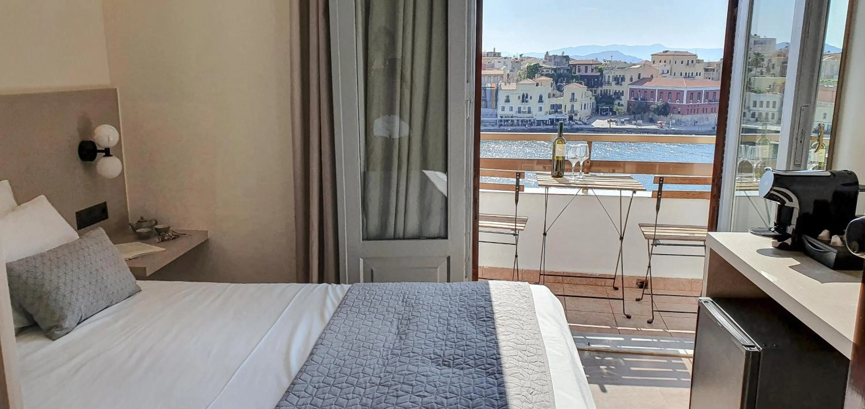 Balcony/Terrace, Bed in Amphitrite Hotel
