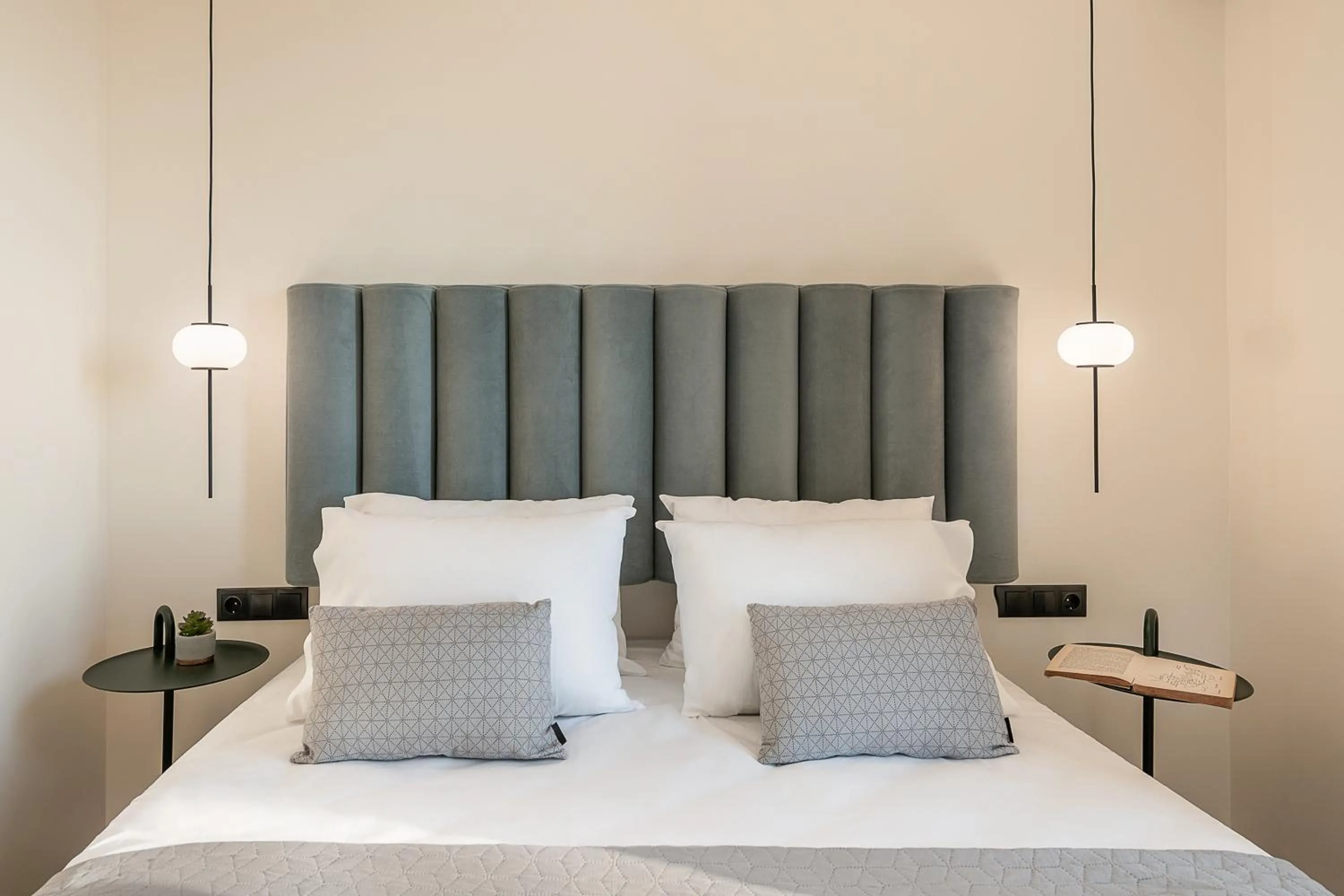 Bed in Amphitrite Hotel