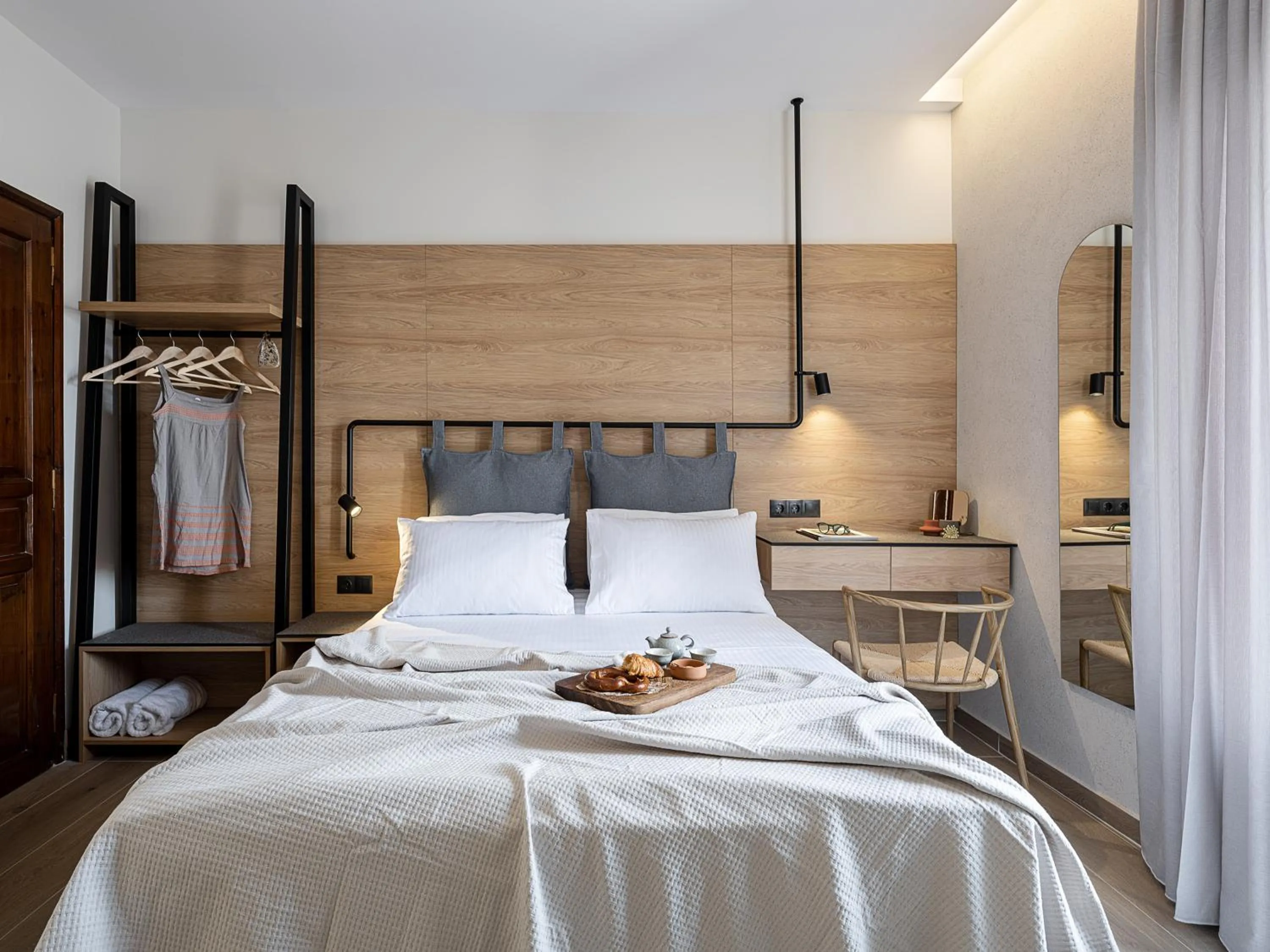 Bed in Amphitrite Hotel