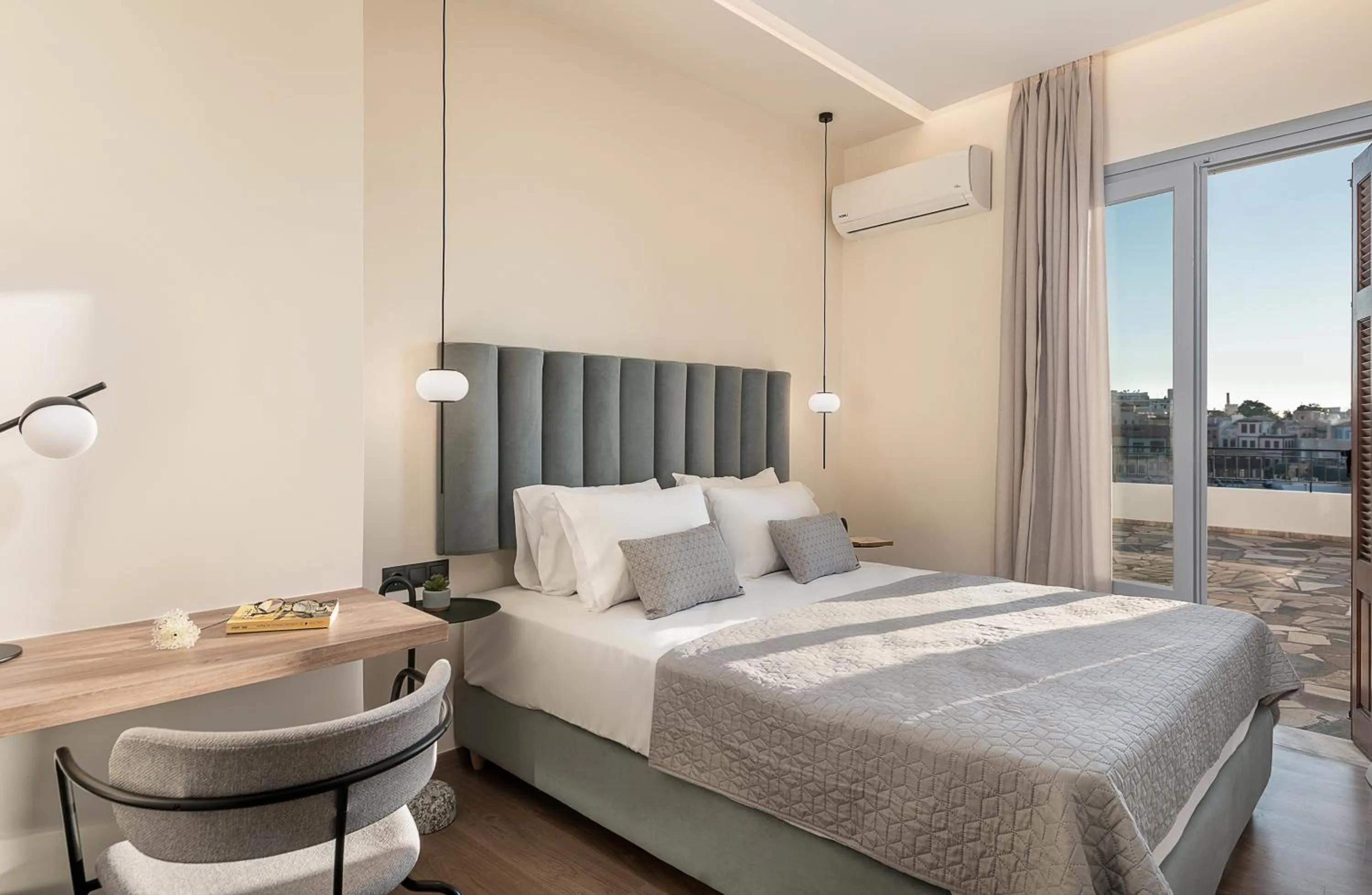 Bed in Amphitrite Hotel